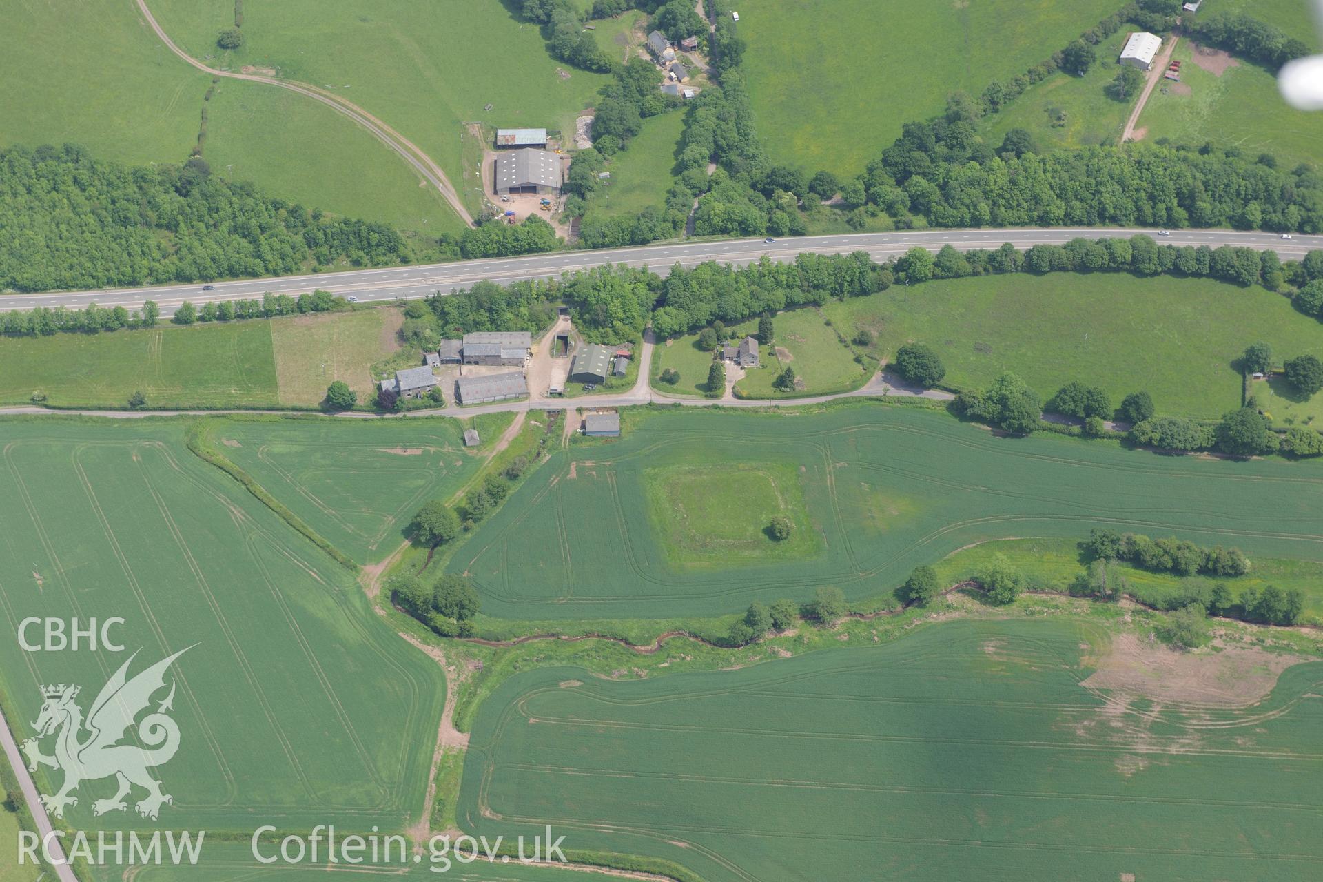 Whitehall farmhouse, farm buildings and moat, Llantristant Fawr. Oblique aerial photograph taken during the Royal Commission's programme of archaeological aerial reconnaissance by Toby Driver on 11th June 2015.