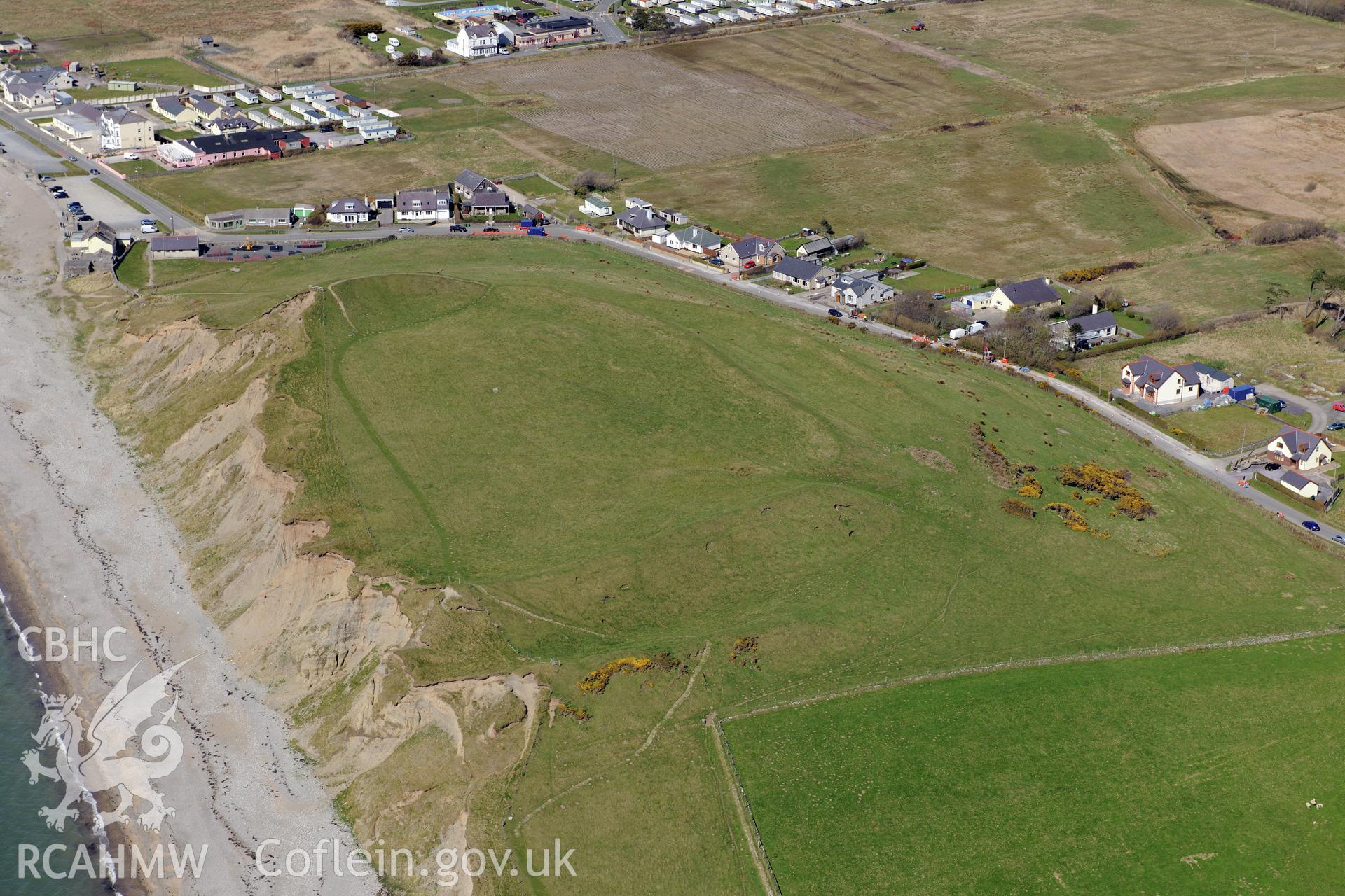 Dinas Dinlle Hillfort, Llandwrog. Oblique aerial photograph taken during the Royal Commission?s programme of archaeological aerial reconnaissance by Toby Driver on 1st May 2013.