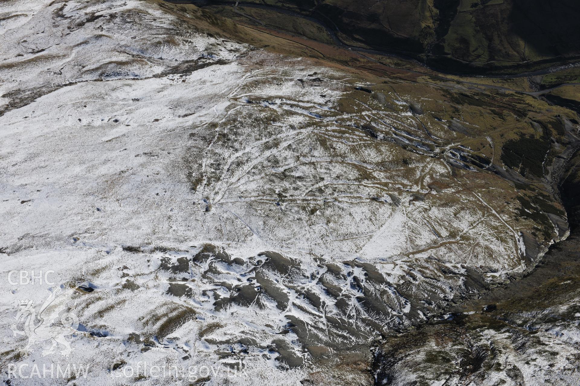 Former Copa Hill opencast mine, Cwmystwyth, south west of Llangurig. Oblique aerial photograph taken during the Royal Commission's programme of archaeological aerial reconnaissance by Toby Driver on 4th February 2015.