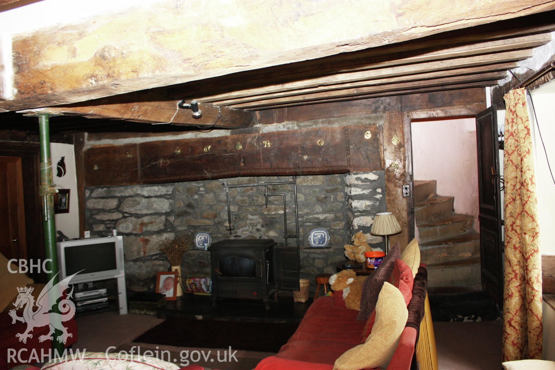 Fireplace, staircase and wooden beams at Glanhafon-Fawr Farmhouse. Photographic survey of Glanhafon-Fawr Farmhouse conducted by Geoff Ward on 4th November 2010.