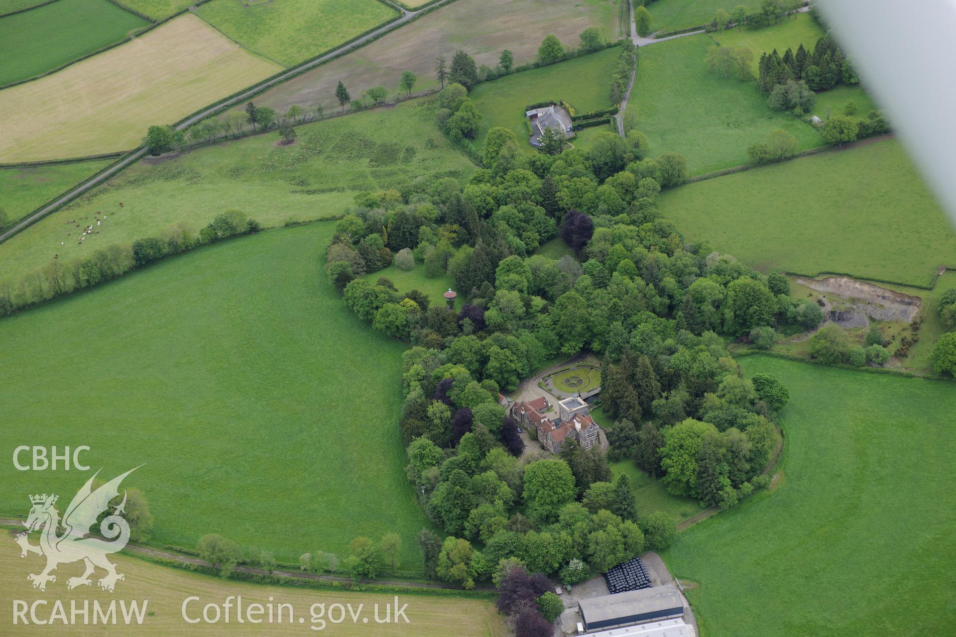 Maes-y-Crugiau Manor and Gardens, Llanllwni. Oblique aerial photograph taken during the Royal Commission's programme of archaeological aerial reconnaissance by Toby Driver on 3rd June 2015.