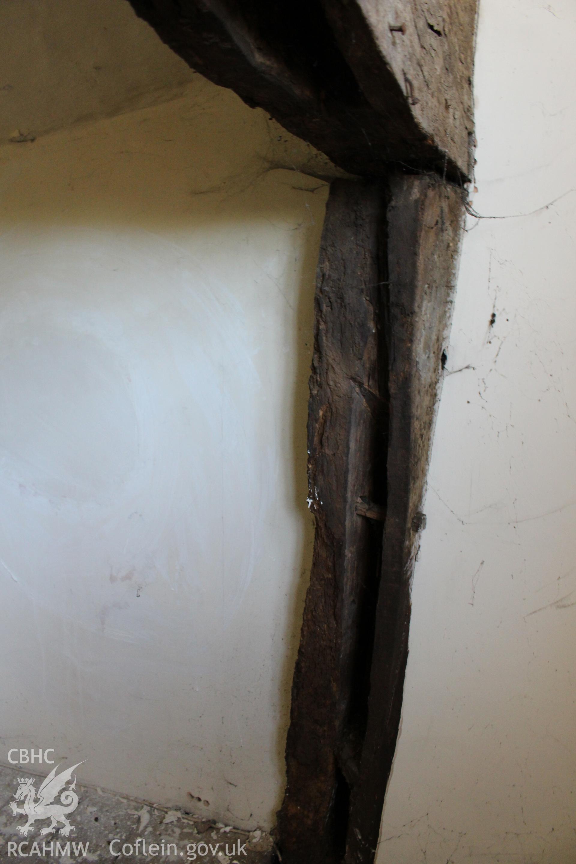 Colour photograph showing detail of timber frame at 5-7 Mwrog Street, Ruthin. Photographed during survey conducted by Geoff Ward on 14th May 2014.