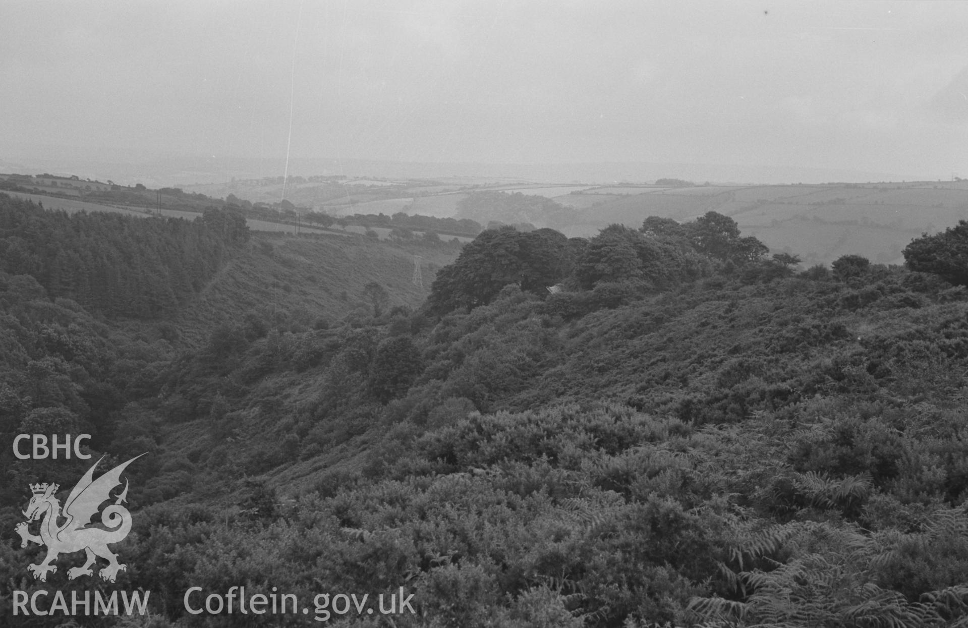 Digital copy of a black and white negative showing panoramic view of Carn Wen iron age camp, the Nant Cloigen and Pen-y-Graig farm, 2.3km east of Ffostrasol. Photographed by Arthur O. Chater in August 1967. (Looking north east - south from Grid Reference SN 394 471). [Photo 4 of 4]