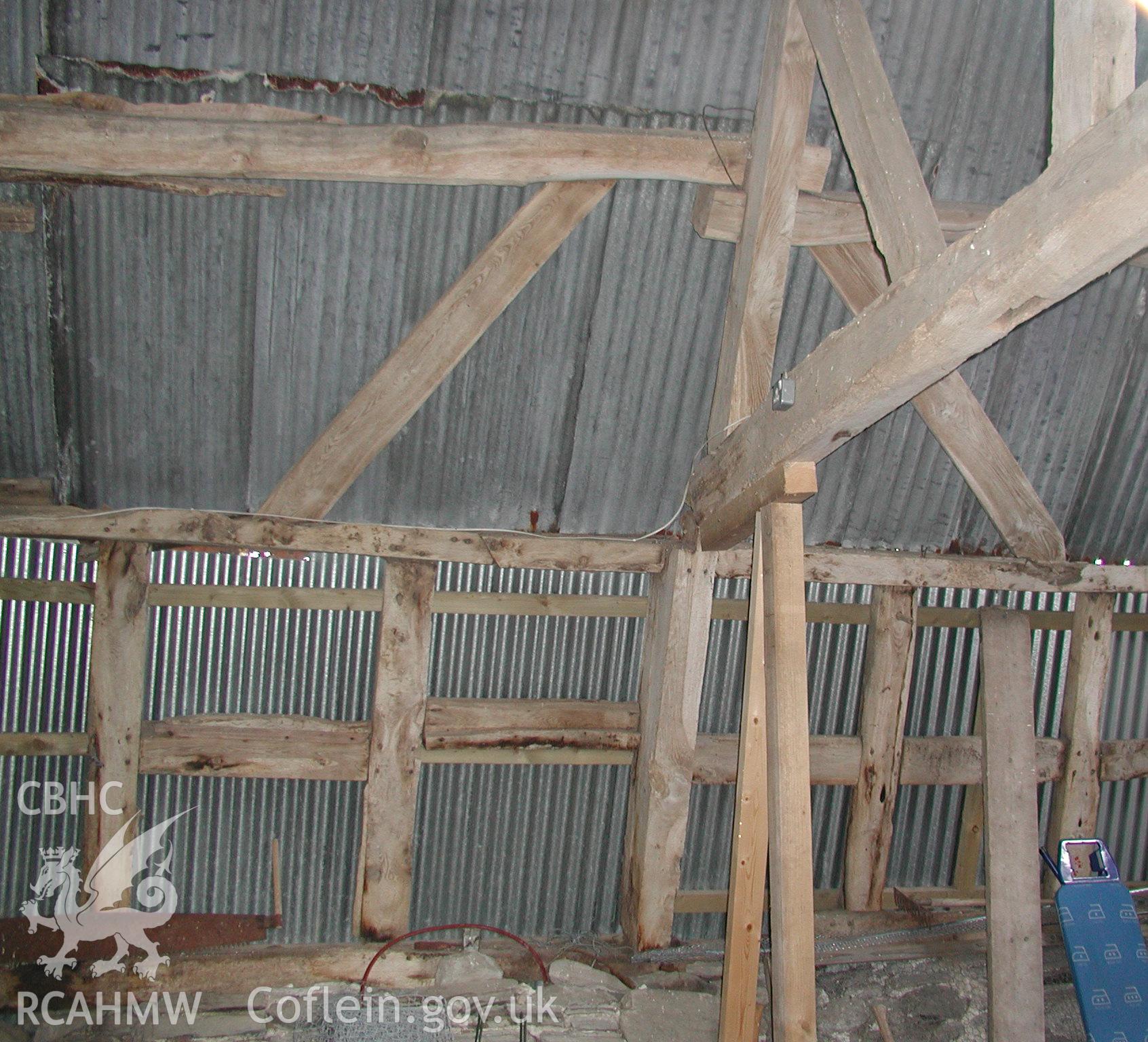 Interior view of shed or barn at Pistyll Gwyn Farmstead showing corrugated iron roof and timber frame. Photographic survey of Pistyll Gwyn Farmstead conducted by Geoff Ward on 13th November 2007.