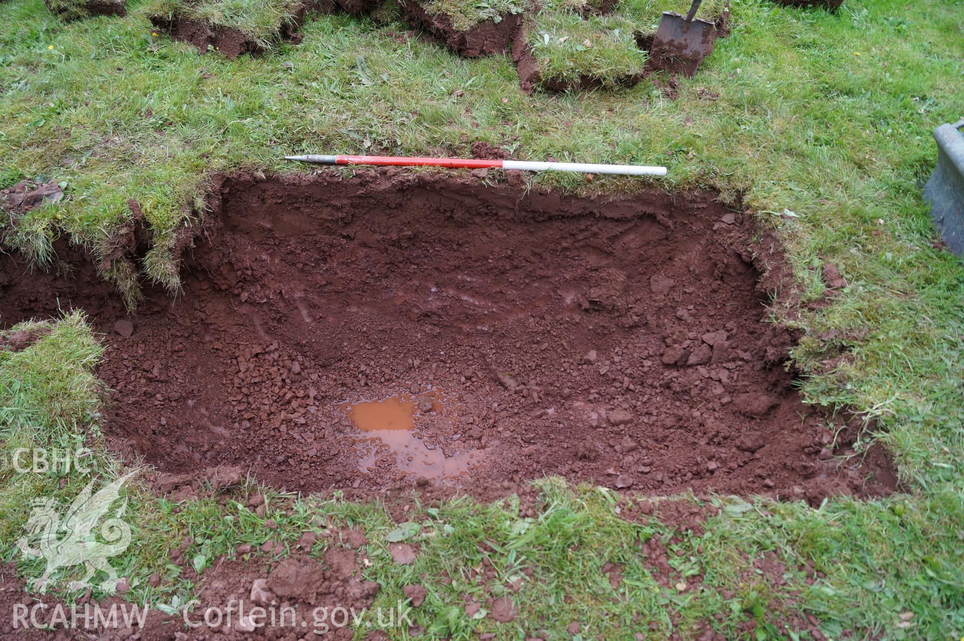 'Soakaway at the northwest end of Trench 2, looking southeast' at Capel Gwynfe, Llangadod. Photograph and description by Jenny Hall and Paul Sambrook of Trysor, May 2018.