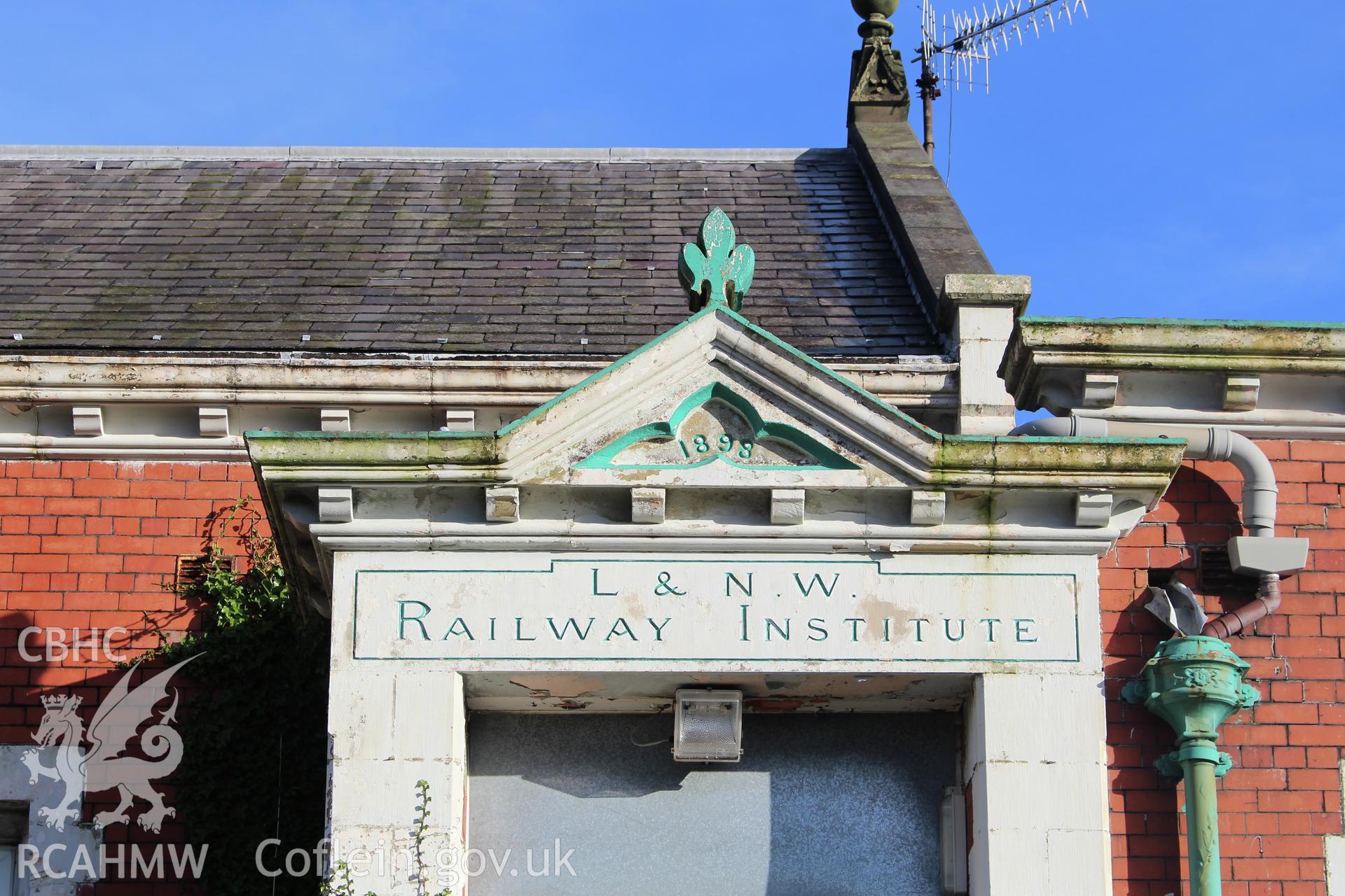 Detailed view of writing above entrance at the Railway Institute, Bangor. Photographed during survey conducted by Sue Fielding for the RCAHMW on 4th April 2016. Transcript: "1898 / L & N. W. / Railway Institute"