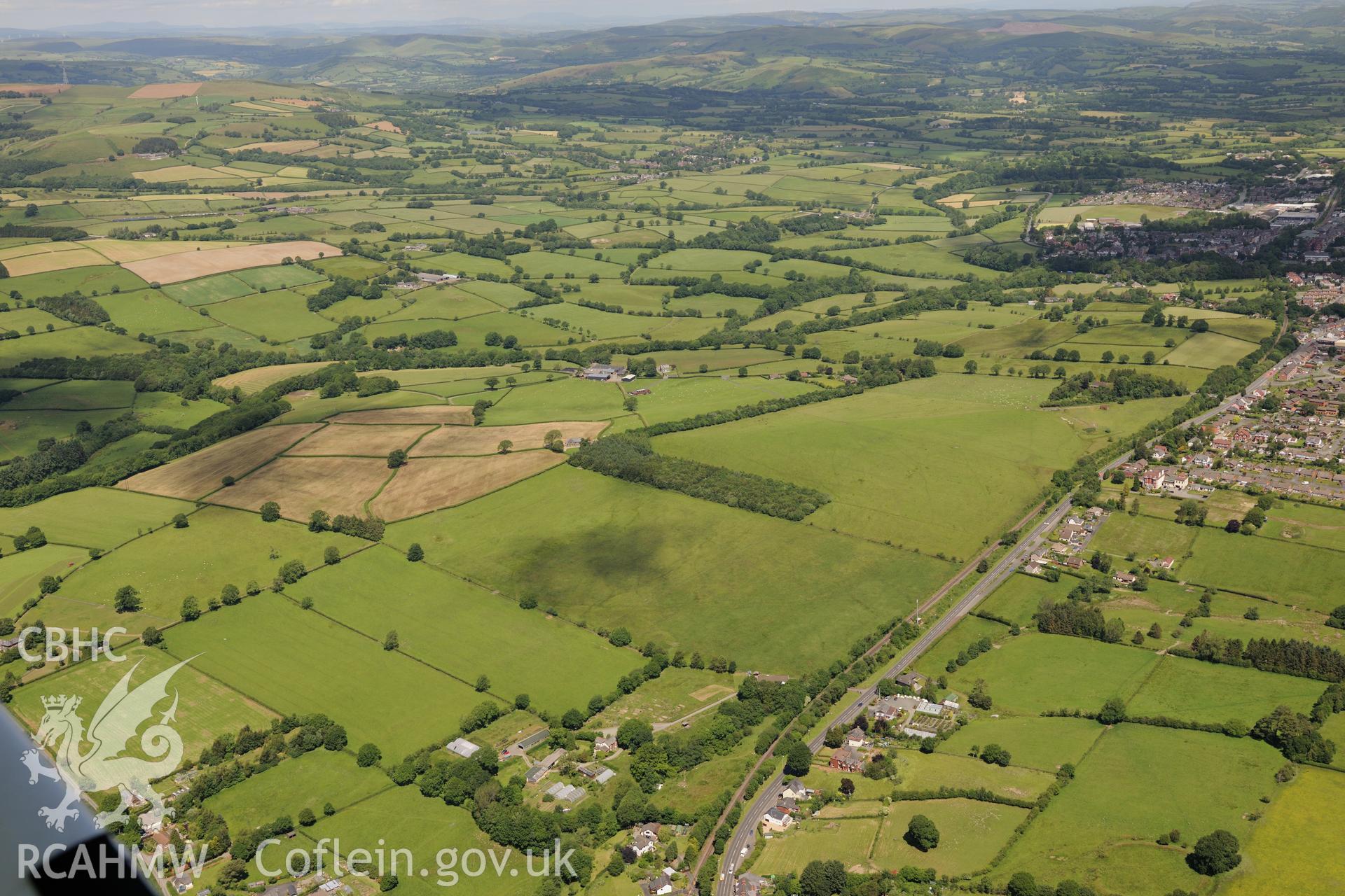Llandrindod Common road camp XVI, south west of Llandrindod Wells on the A483. Oblique aerial photograph taken during the Royal Commission's programme of archaeological aerial reconnaissance by Toby Driver on 30th June 2015.