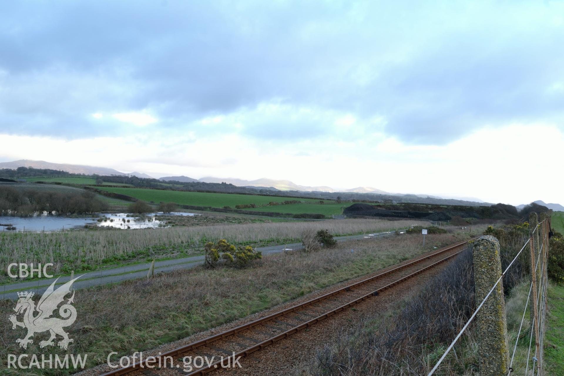View along railway line and possible location of crane, Tomen Fawr, Llanystumdwy. Photographed by Gwynedd Archaeological Trust during impact assessment of the site on 20th December 2018. Project no. G2564.