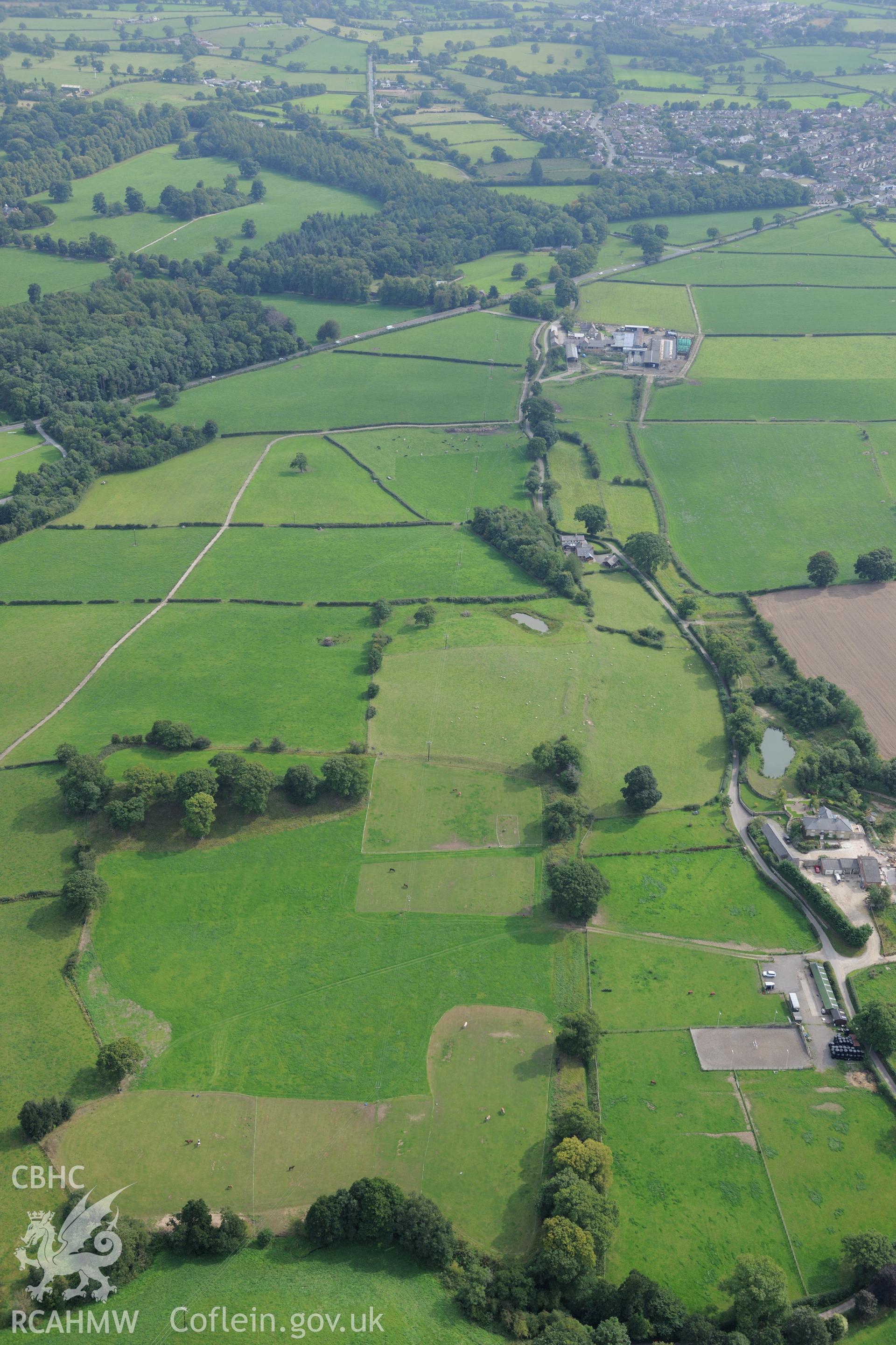 Part of the section of Wat's Dyke running from Chester-Holywell Road to Soughton Farm. Oblique aerial photograph taken during the Royal Commission's programme of archaeological aerial reconnaissance by Toby Driver on 11th September 2015.