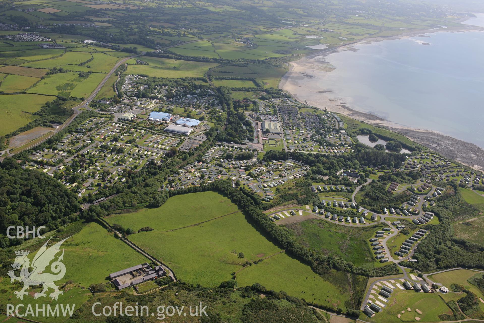 Penychain farm and Hafan y Mor Holiday Park, near Pwllheli. Oblique aerial photograph taken during the Royal Commission's programme of archaeological aerial reconnaissance by Toby Driver on 23rd June 2015.