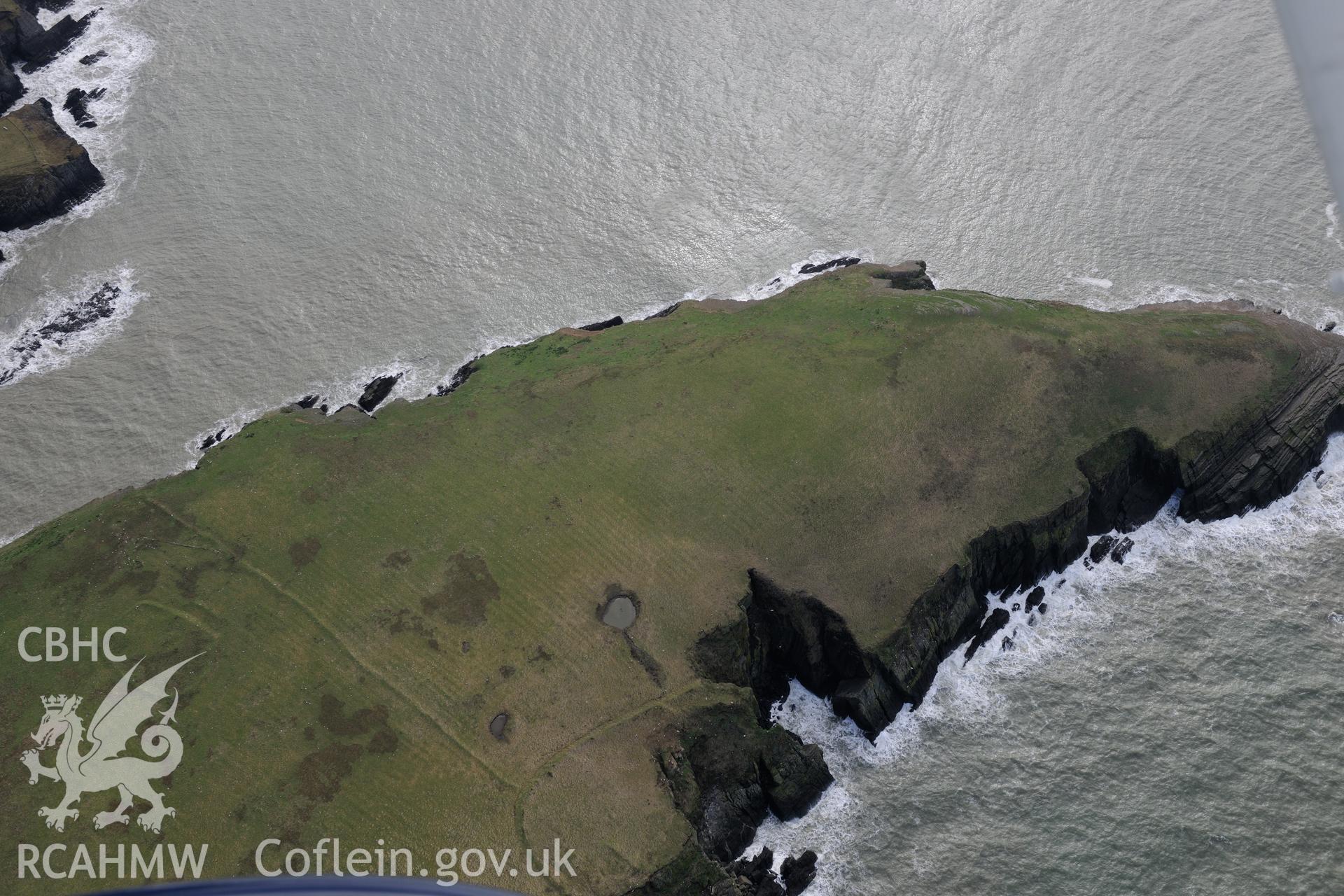 Cardigan Island. From a set of oblique aerial orbital photographs taken for "structure from motion" processing during the Royal Commission's programme of archaeological aerial reconnaissance by Toby Driver on 13th March 2015.