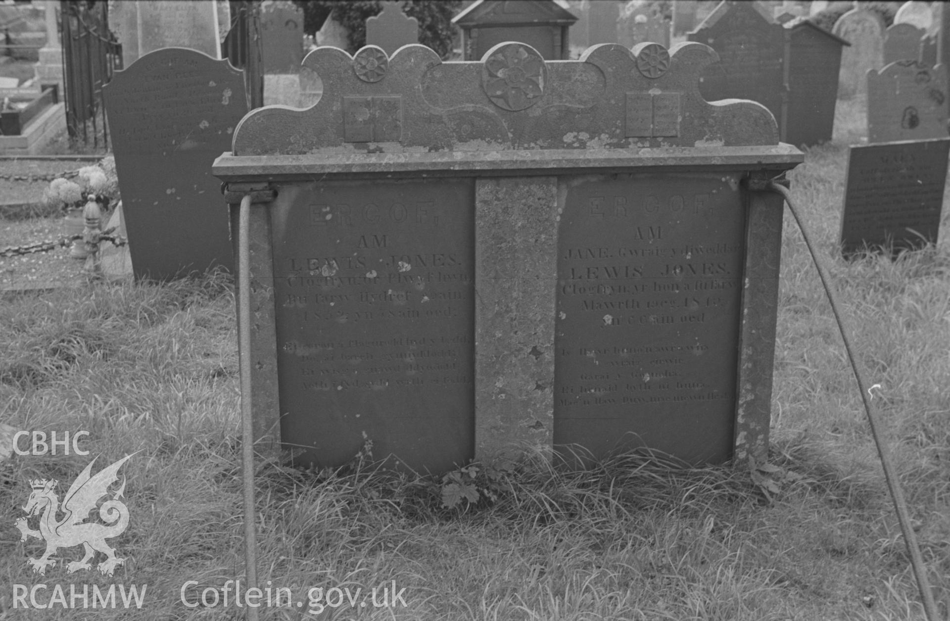 Digital copy of a black and white negative showing gravestones to the memory of Lewis and Jane Jones, at St. David's Church, Henfynyw, Aberaeron. Photographed by Arthur O. Chater on 5th September 1966 from Grid Reference SN 447 613.