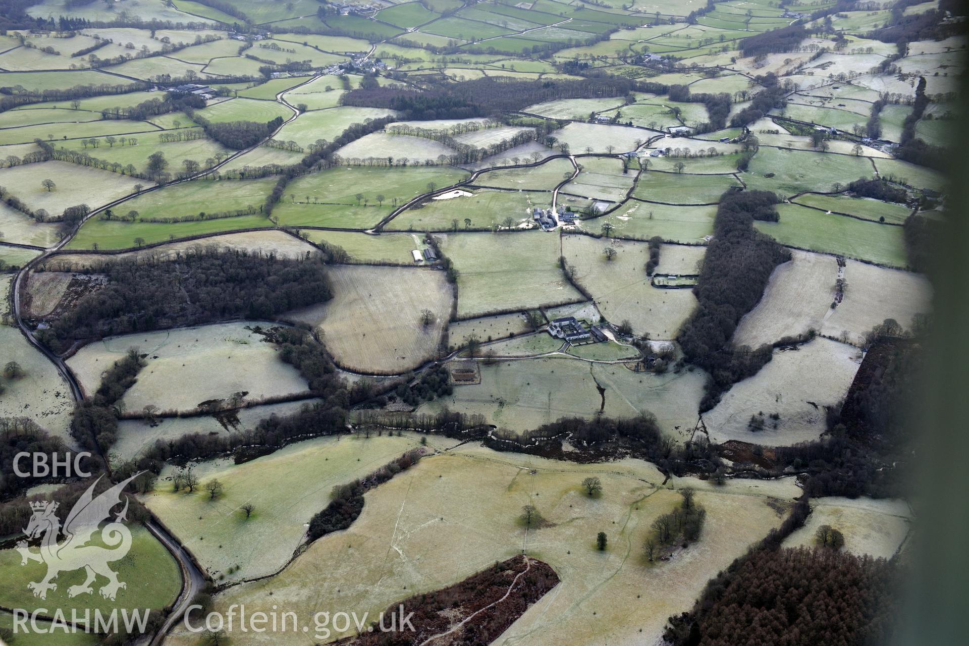 Llwynywormwood mansion and farmstead, south of Llandovery. Oblique aerial photograph taken during the Royal Commission?s programme of archaeological aerial reconnaissance by Toby Driver on 15th January 2013.