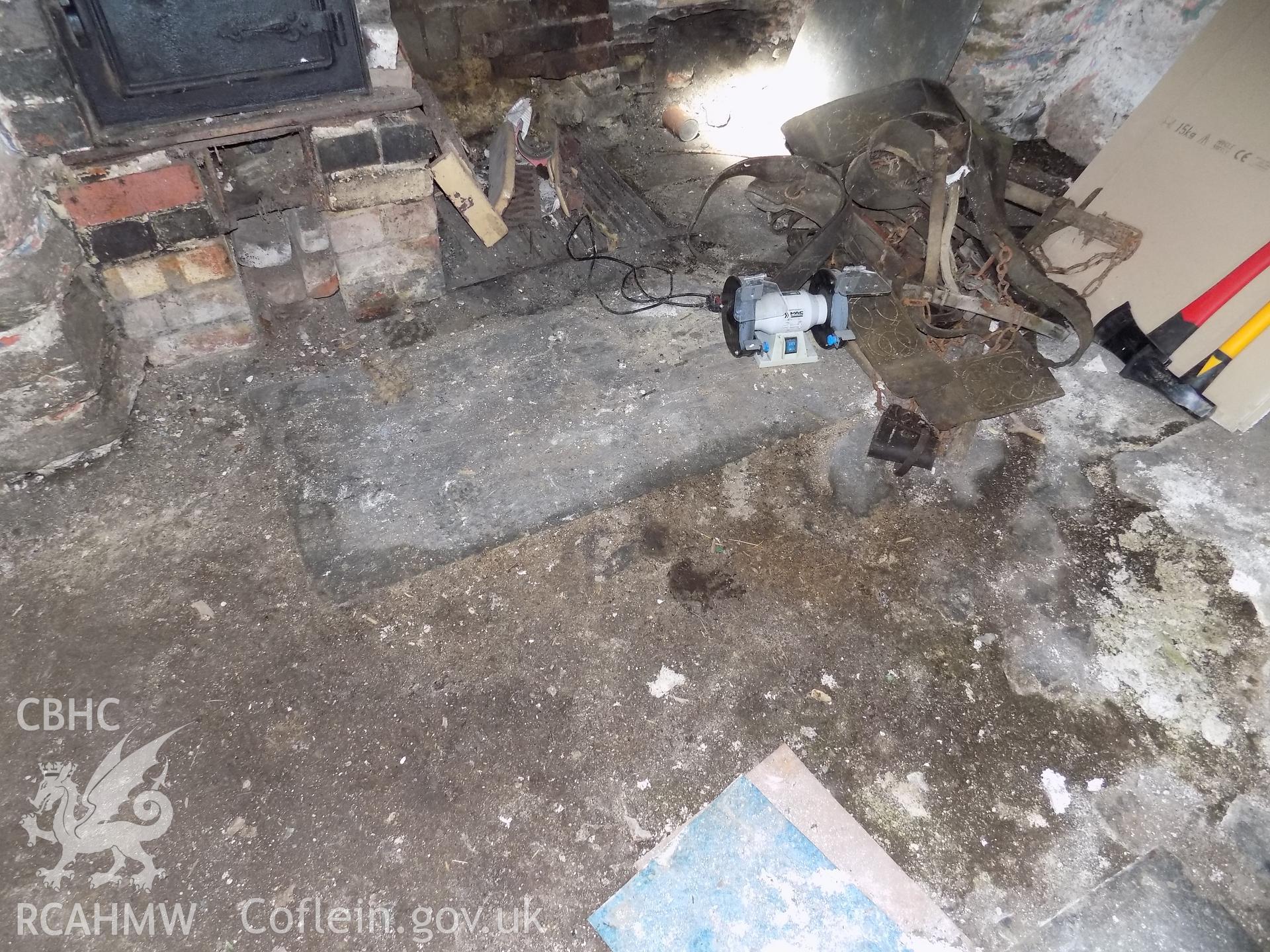 Digital colour photograph showing detailed view of interior floor in building attached to Tywyll Nodwydd house, Pennal, dated 2019. Photographed by Mr Gary Coulsby to meet a condition attached to a planning application.