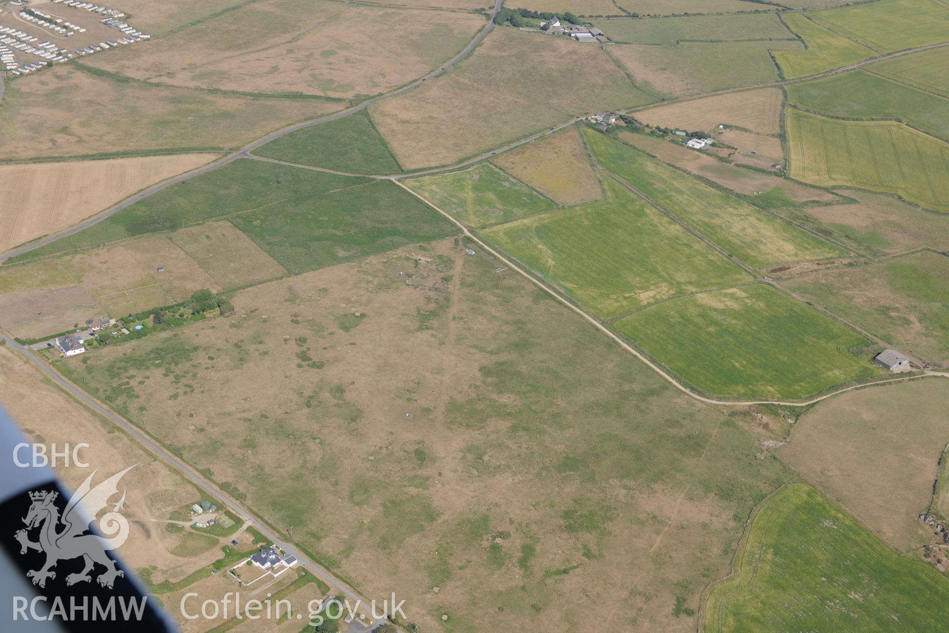 Parchmarks of possible township at Croes Phillip, St Davids. Oblique aerial photograph taken during the Royal Commission?s programme of archaeological aerial reconnaissance by Toby Driver on 16th July 2013.