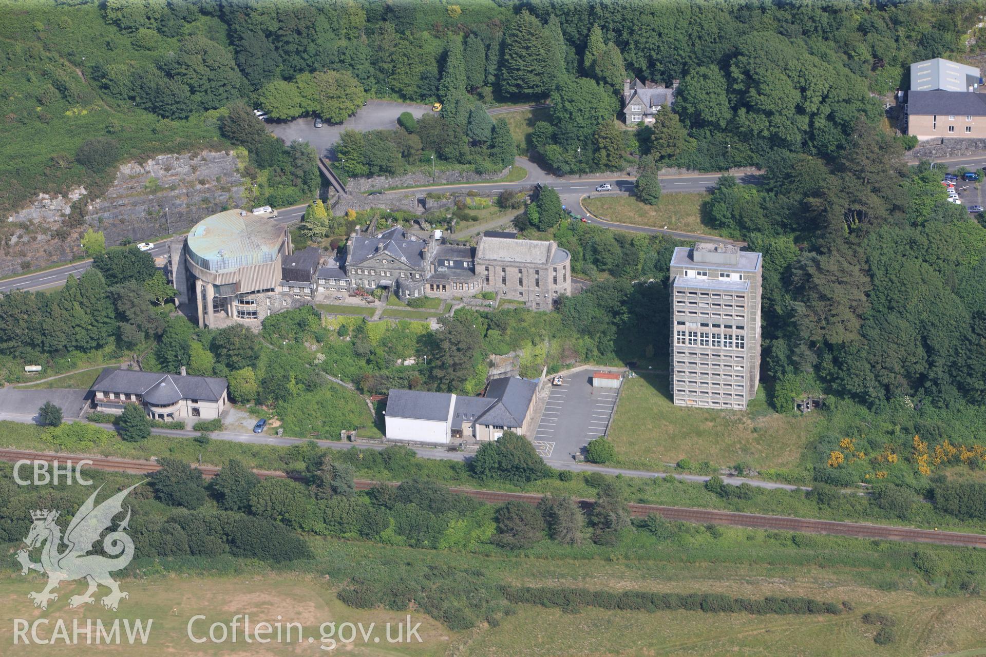 Theatr Ardudwy, Plas Wernfawr and the accommodation tower, all at Coleg Harlech, Ffordd Newydd, Harlech. Oblique aerial photograph taken during the Royal Commission?s programme of archaeological aerial reconnaissance by Toby Driver on 12th July 2013.