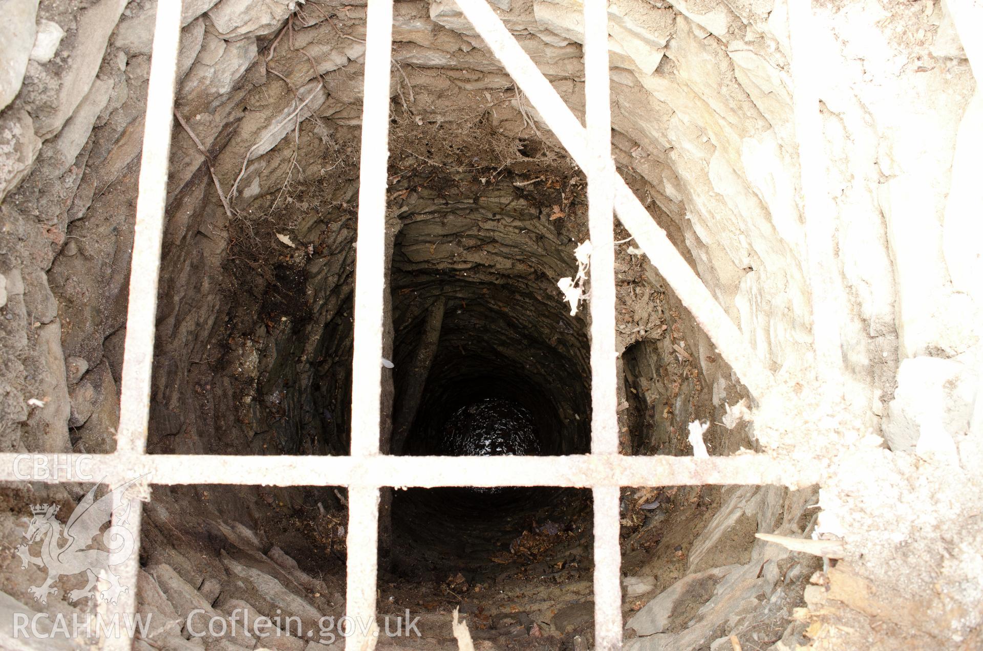 'Interior of well, view from the north north east.' Photographed by Gwynedd Archaeological Trust as part of archaeological mitigation report for well at Plas Celynin, Henryd, Conwy, on 1st August 2018. Project no. G2568.