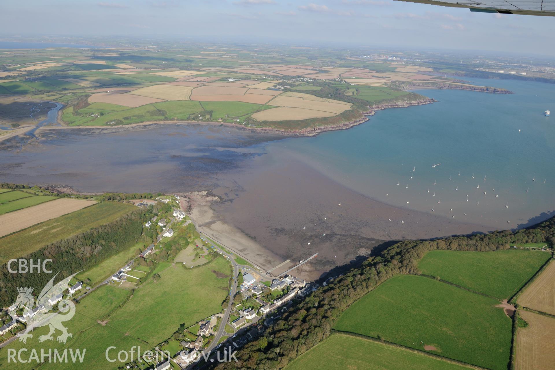 The village of Dale and its landing place on the Pembrokeshire coast, west of Milford Haven. Oblique aerial photograph taken during Royal Commission's programme of archaeological aerial reconnaissance by Toby Driver on 30th September 2015.