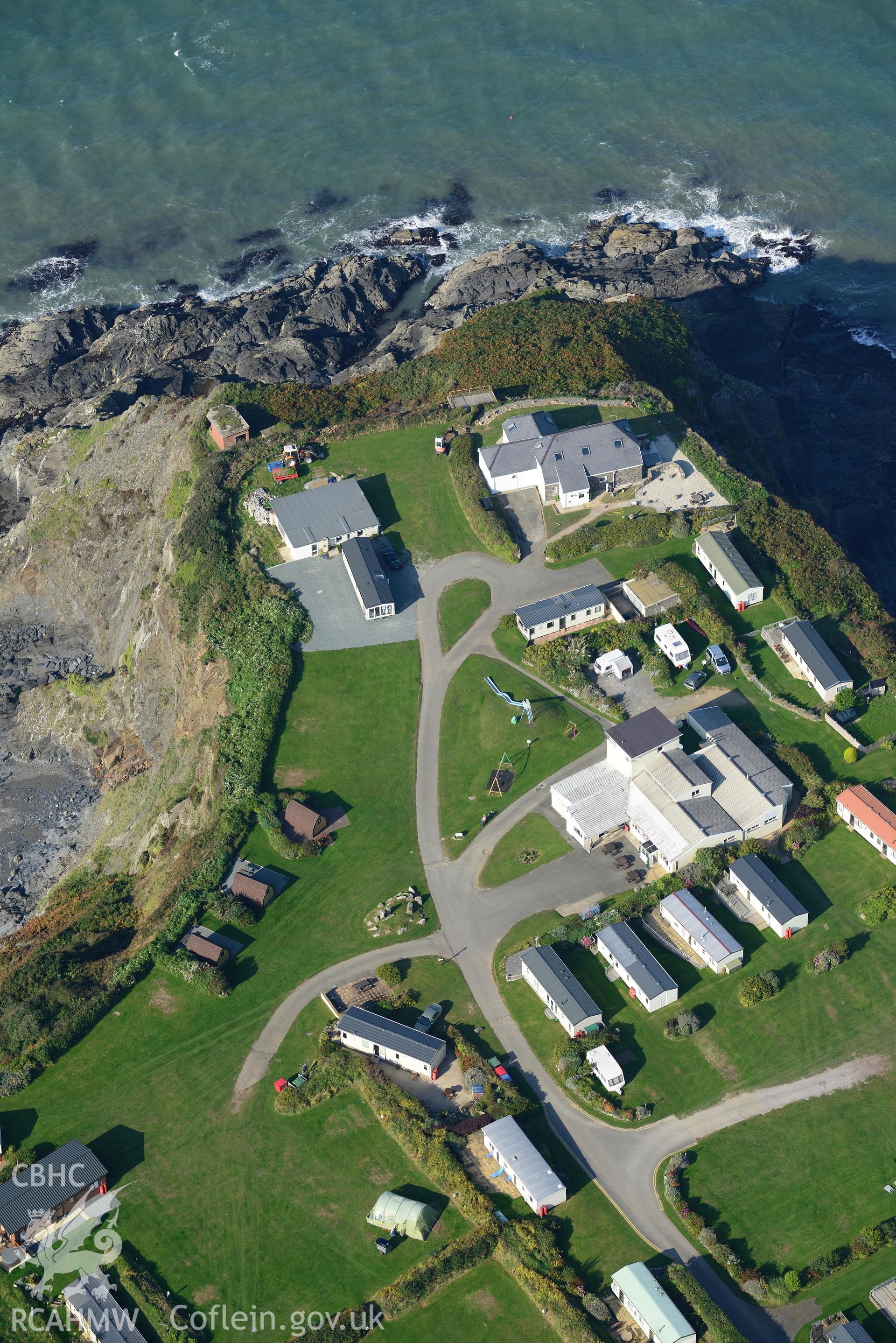 Fishguard battery, Penrhyn, on the shores of Fishguard Bay. Oblique aerial photograph taken during the Royal Commission's programme of archaeological aerial reconnaissance by Toby Driver on 30th September 2015.