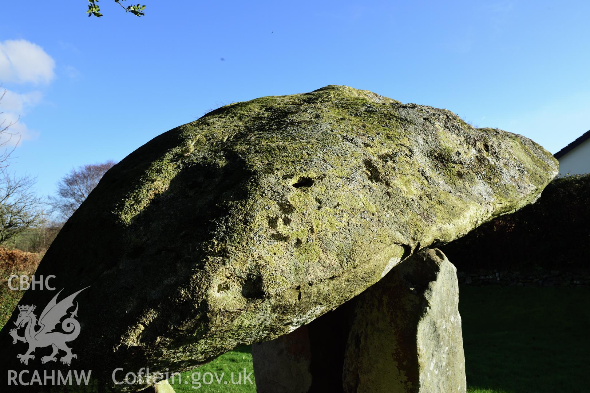 Royal Commission photo survey of Carreg Coetan chambered tomb in winter light, by Toby Driver