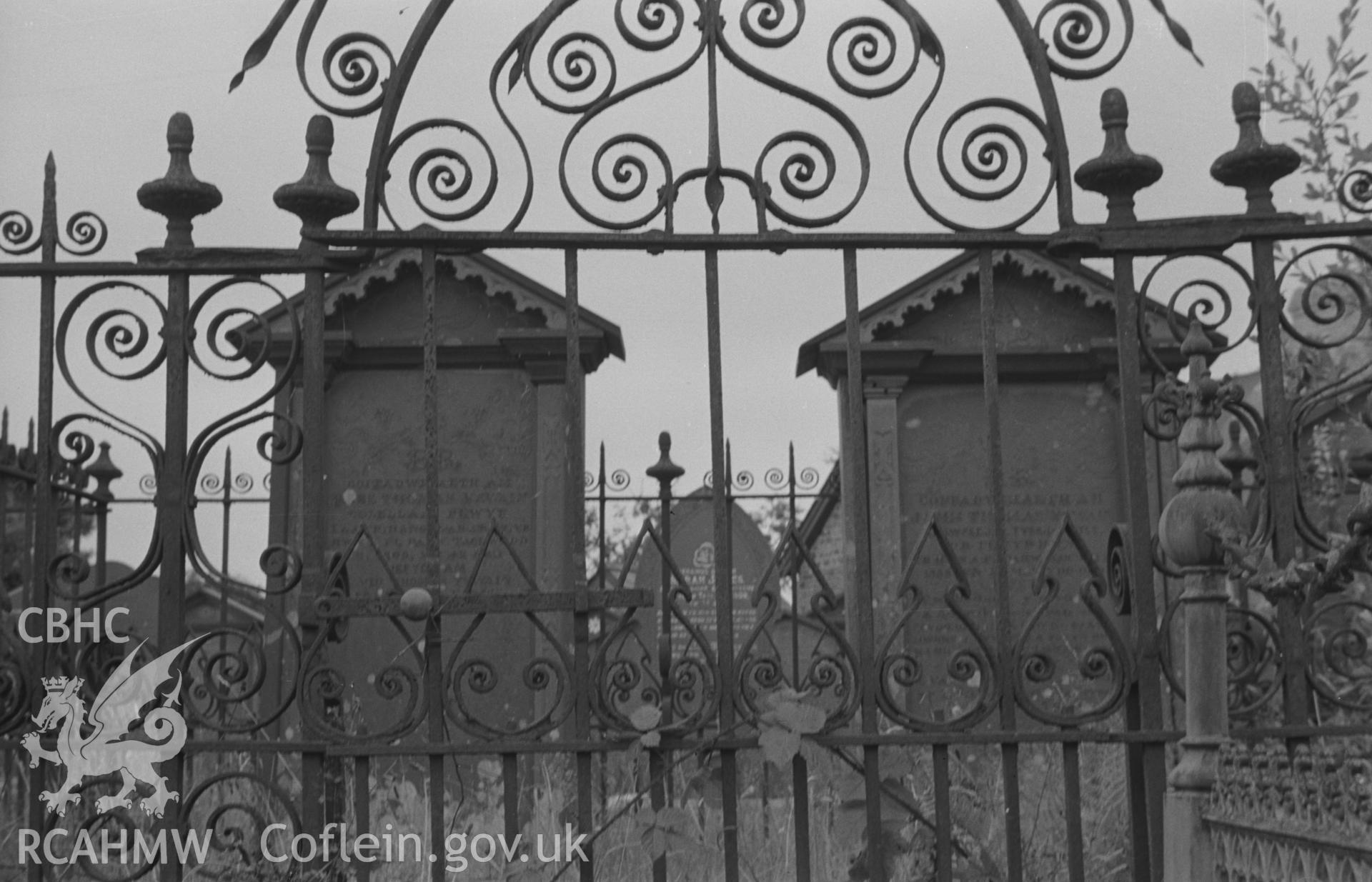 Digital copy of a black and white negative showing view of wrought iron gates at Capel Pant-y-Defaid Welsh Unitarian chapel, Pren-Gwyn, Llandysul. Photographed by Arthur O. Chater on 7th September 1966.