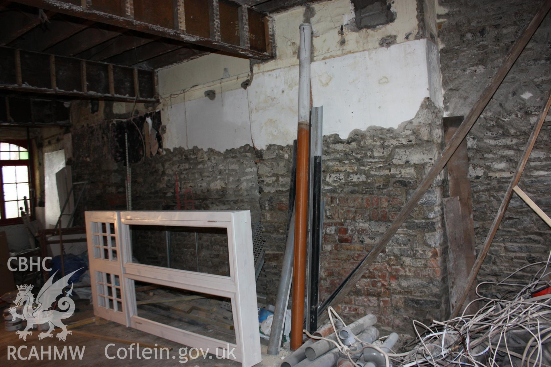 Colour photograph showing interior view of ground floor fireplaces at the Old Auction Rooms/ Liberal Club in Aberystwyth. Photographic survey conducted by Geoff Ward on 9th June 2010 during repair work prior to conversion into flats.