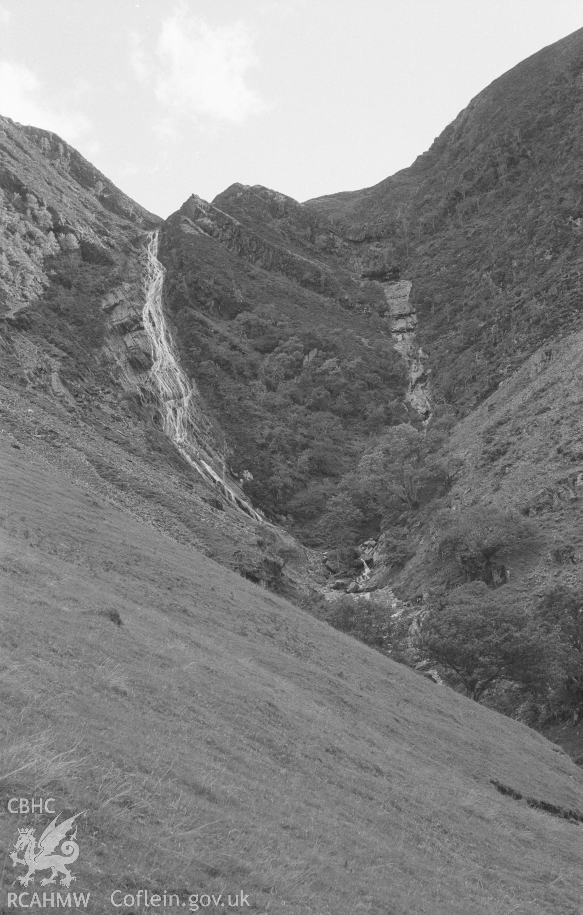 Digital copy of a black and white negative showing view of Pistyll y Llyn, Cwm Rhaiadr, south of Machynlleth. Photographed by Arthur O. Chater in September 1965 from Grid Reference SN 7545 9445, looking south south west.