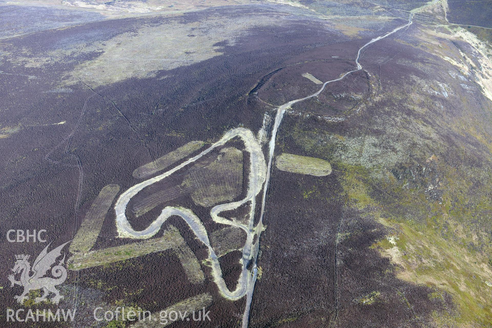 Moel-y-Gair hillfort on Llantysilio mountain, north west of Llangollen. Oblique aerial photograph taken during the Royal Commission?s programme of archaeological aerial reconnaissance by Toby Driver on 28th February 2013.