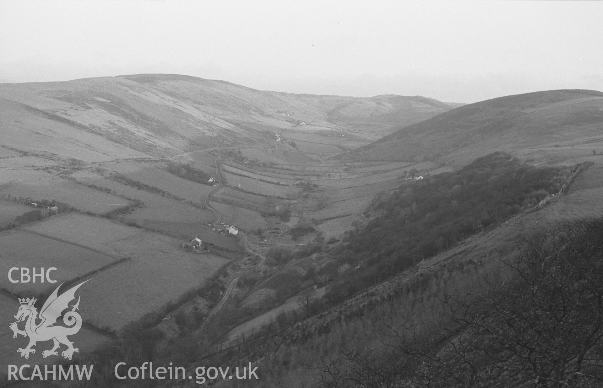 Digital copy of a black and white negative showing Cwm-Erfin from the north side of Daren iron age camp above Coed-y-Daren. Photographed in December 1963 by Arthur O. Chater from Grid Reference SN 679 831.