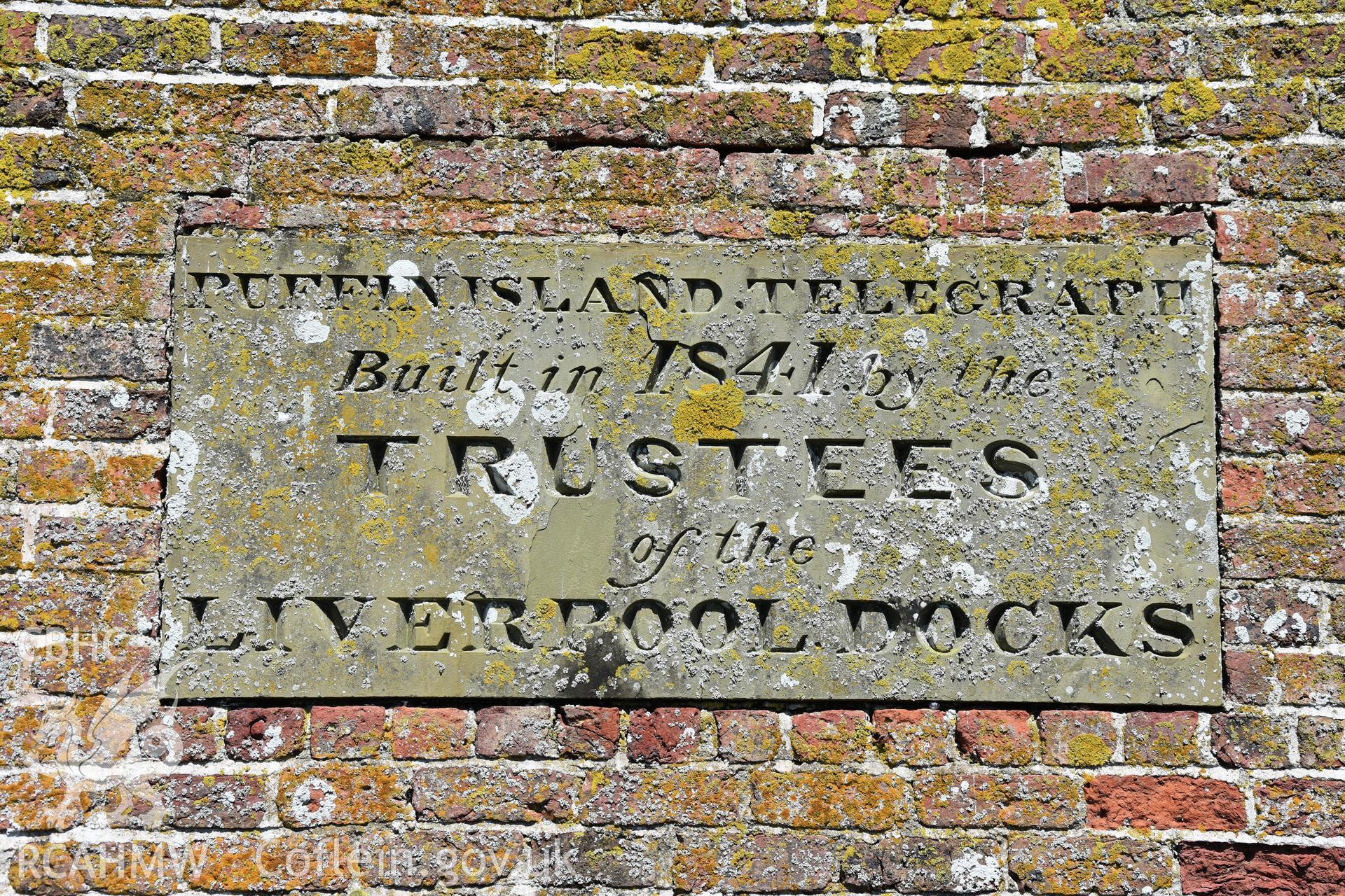 Investigator's photographic survey of the Telegraph Station on Puffin Island or Ynys Seiriol for the CHERISH Project. View of external stone plaque on south side of station erected by Trustees of Liverpool Docks. ? Crown: CHERISH PROJECT 2018. Produced with EU funds through the Ireland Wales Co-operation Programme 2014-2020. All material made freely available through the Open Government Licence.