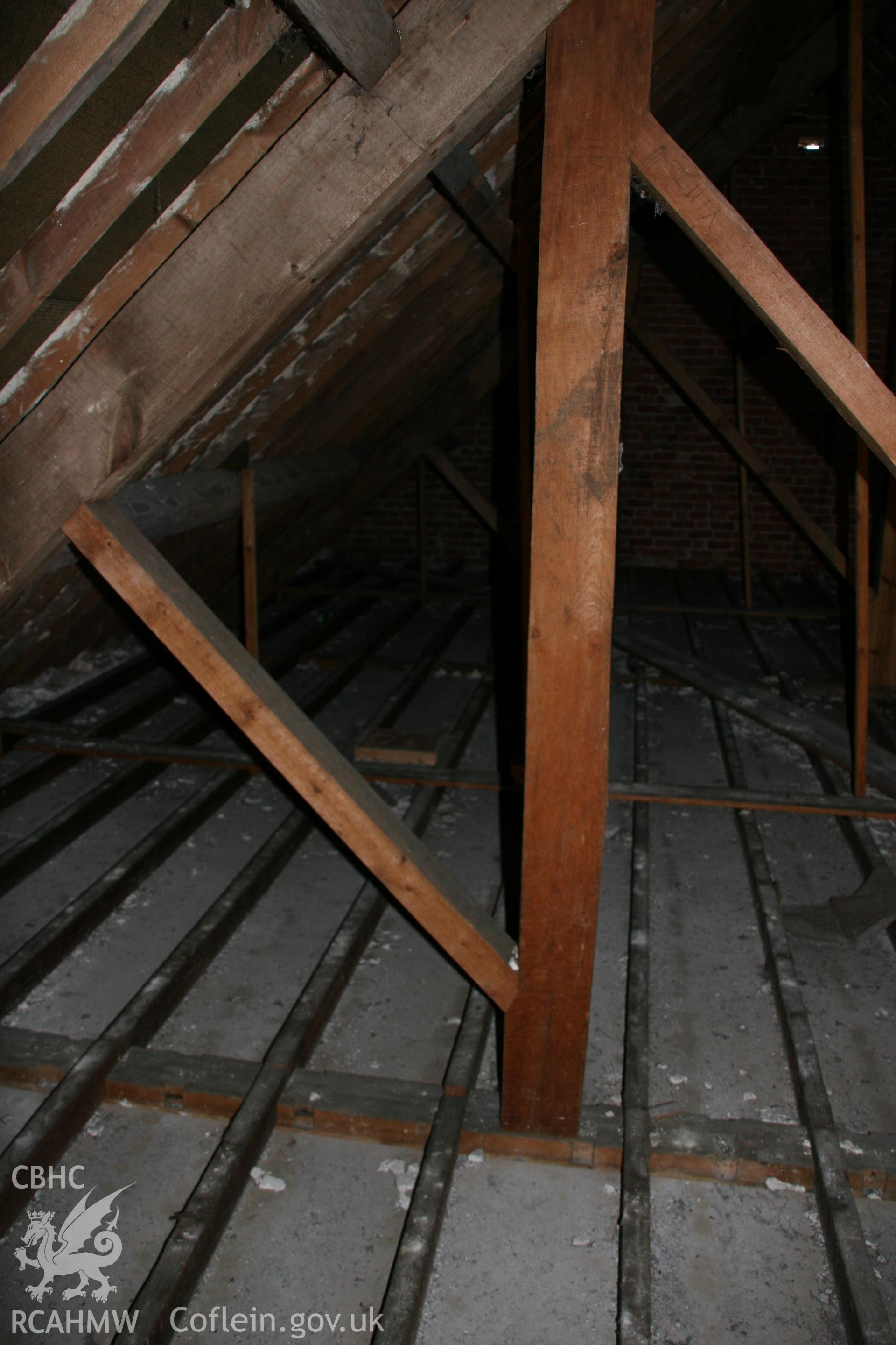 Photograph showing detailed interior view of wooden beams & floorboards in loft of former Llawrybettws Welsh Calvinistic Methodist chapel, Glanyrafon, Corwen. Taken by Tim Allen on 27th February 2019 to meet a condition attached to planning application.