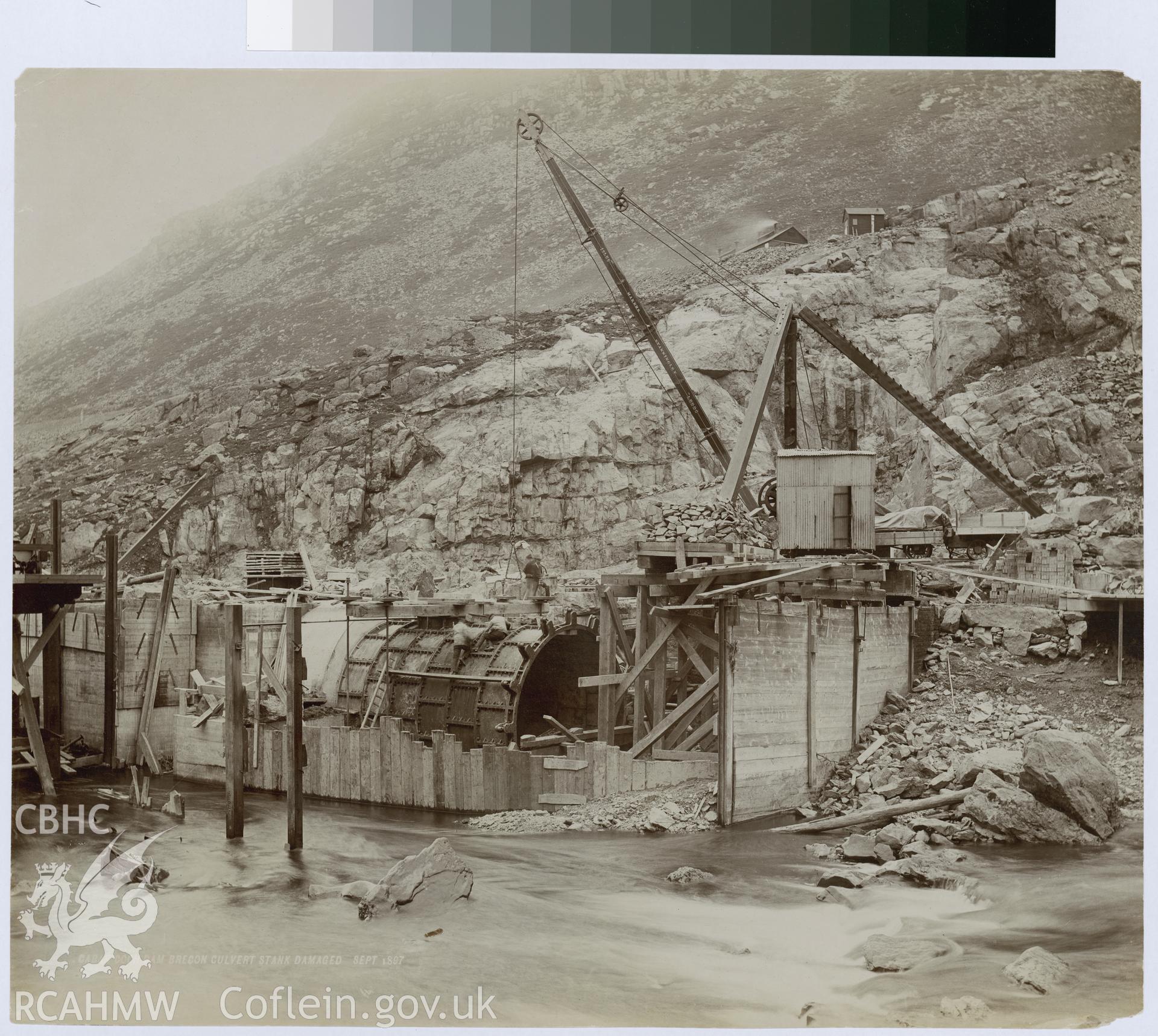 Digital copy of an albumen print from Edward Hubbard Collection showing Caban Coch Dam, with Brecon culvert stank damage, taken September 1897.