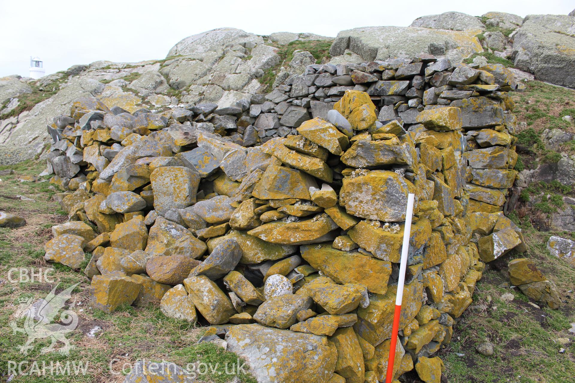 Skerries buoy keeper's cottage or stone shelter. Investigator's photographic survey for the CHERISH Project. ? Crown: CHERISH PROJECT 2018. Produced with EU funds through the Ireland Wales Co-operation Programme 2014-2020. All material made freely available through the Open Government Licence.