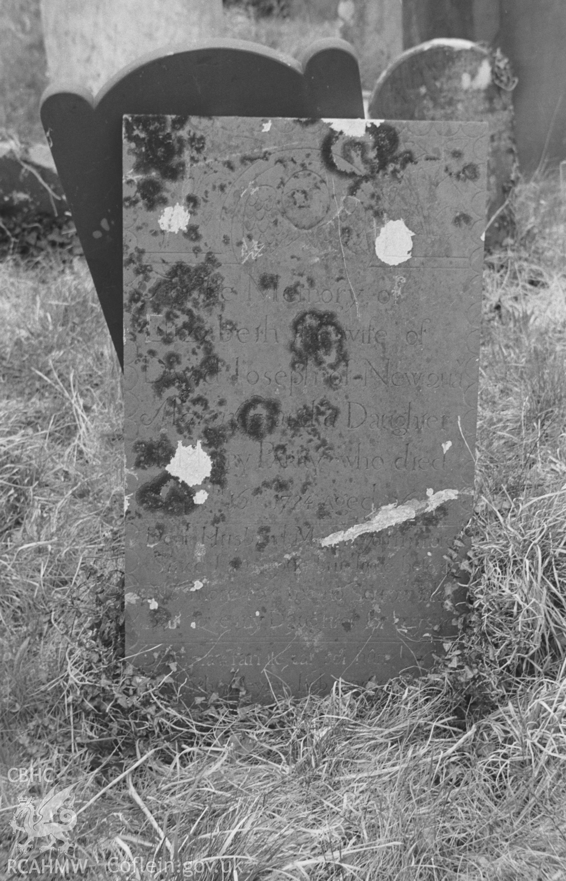 Digital copy of a black and white negative showing gravestone of David Joseph and family at St. Tysilio's church, near Cwmtydu, Llandysioliogogo. Photographed by Arthur O. Chater in April 1966 from Grid Reference SN 363 575.