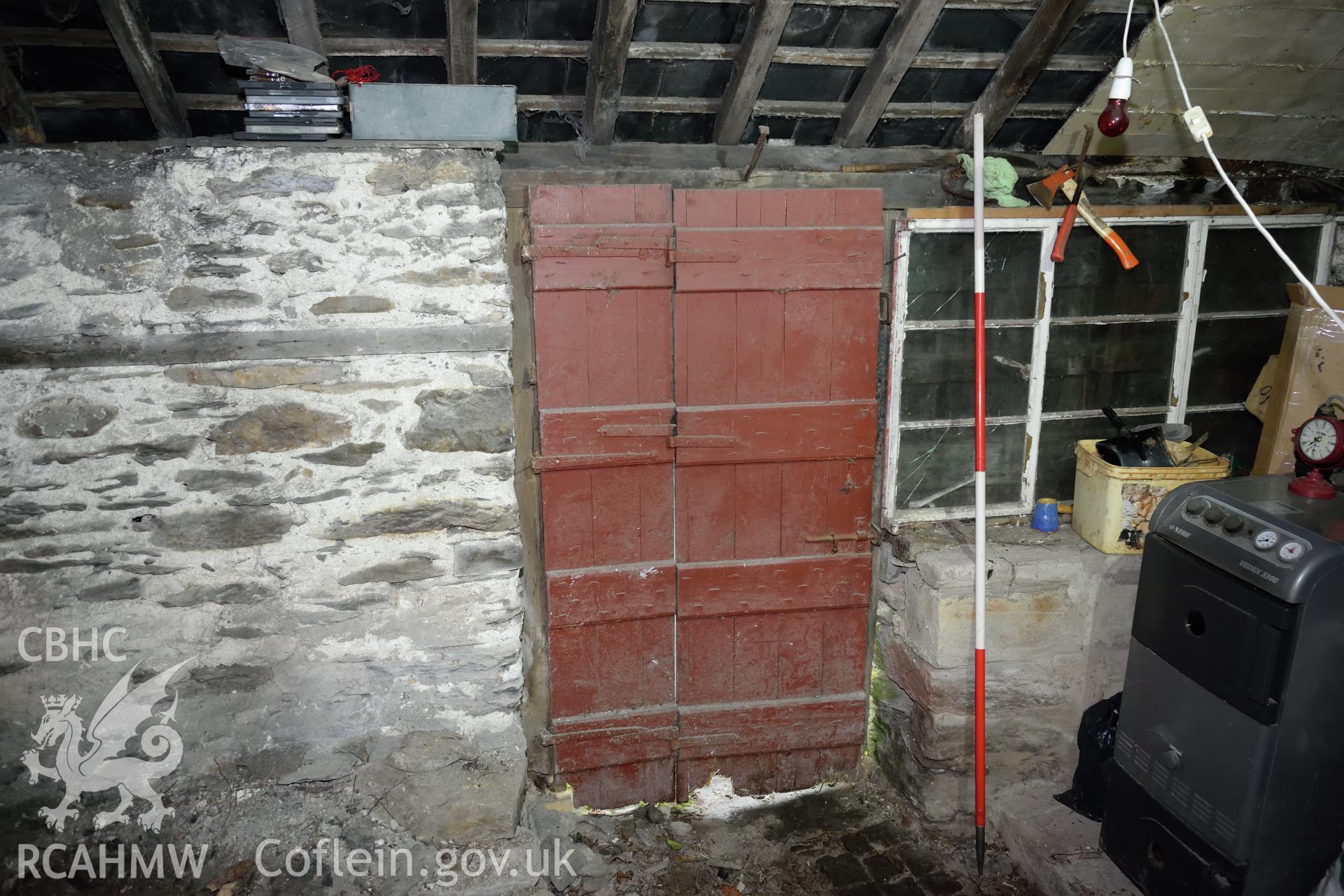 Photograph of the front door and window taken from inside the forge at Glascoed or Islwyn Smithy, Melin-y-Wig, Denbighshire, by I.P. Brooks of Engineering Archaeological Services Ltd. Taken on 5th April 2019.