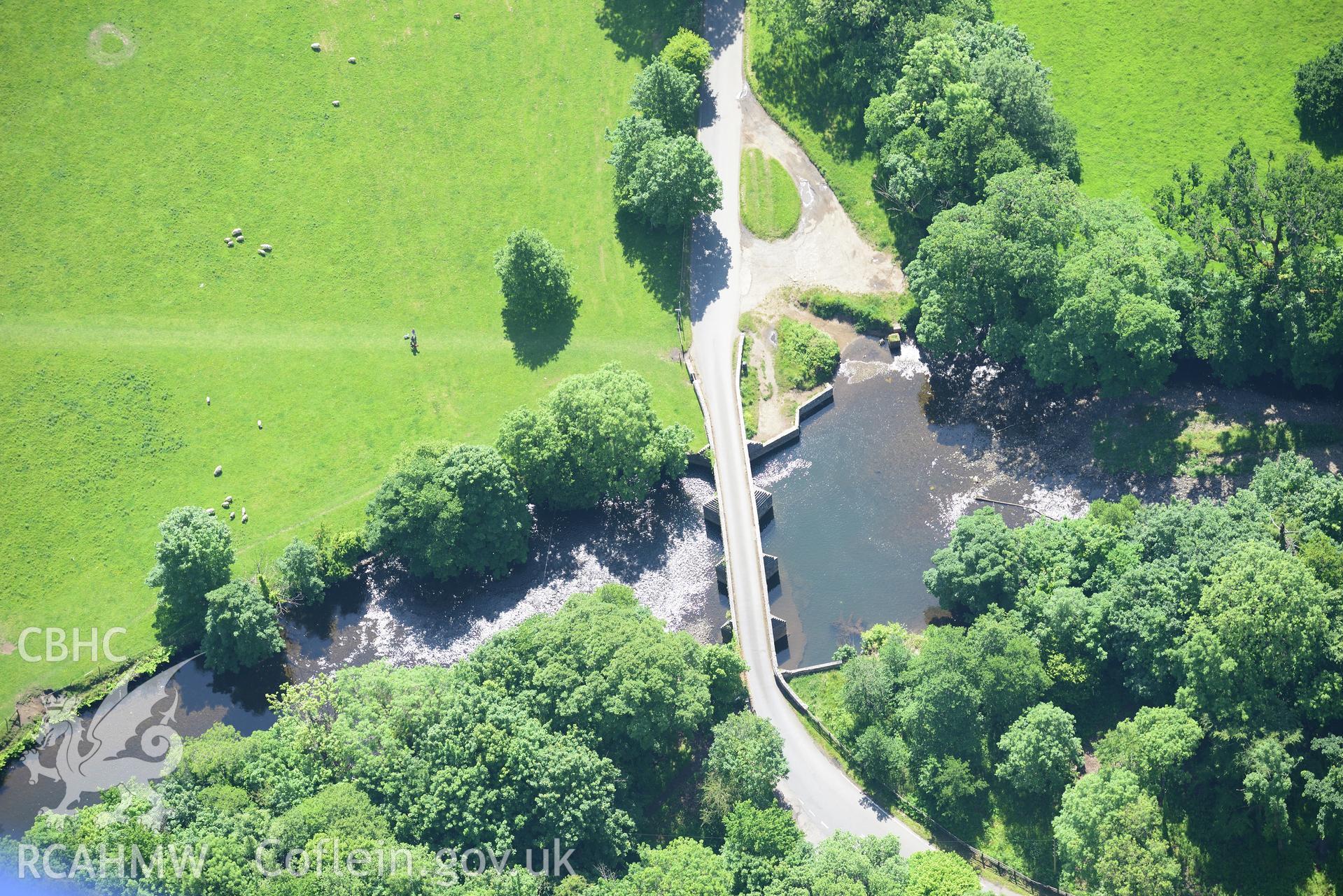 New Inn dipping bridge, Bridgend. Oblique aerial photograph taken during the Royal Commission's programme of archaeological aerial reconnaissance by Toby Driver on 19th June 2015.