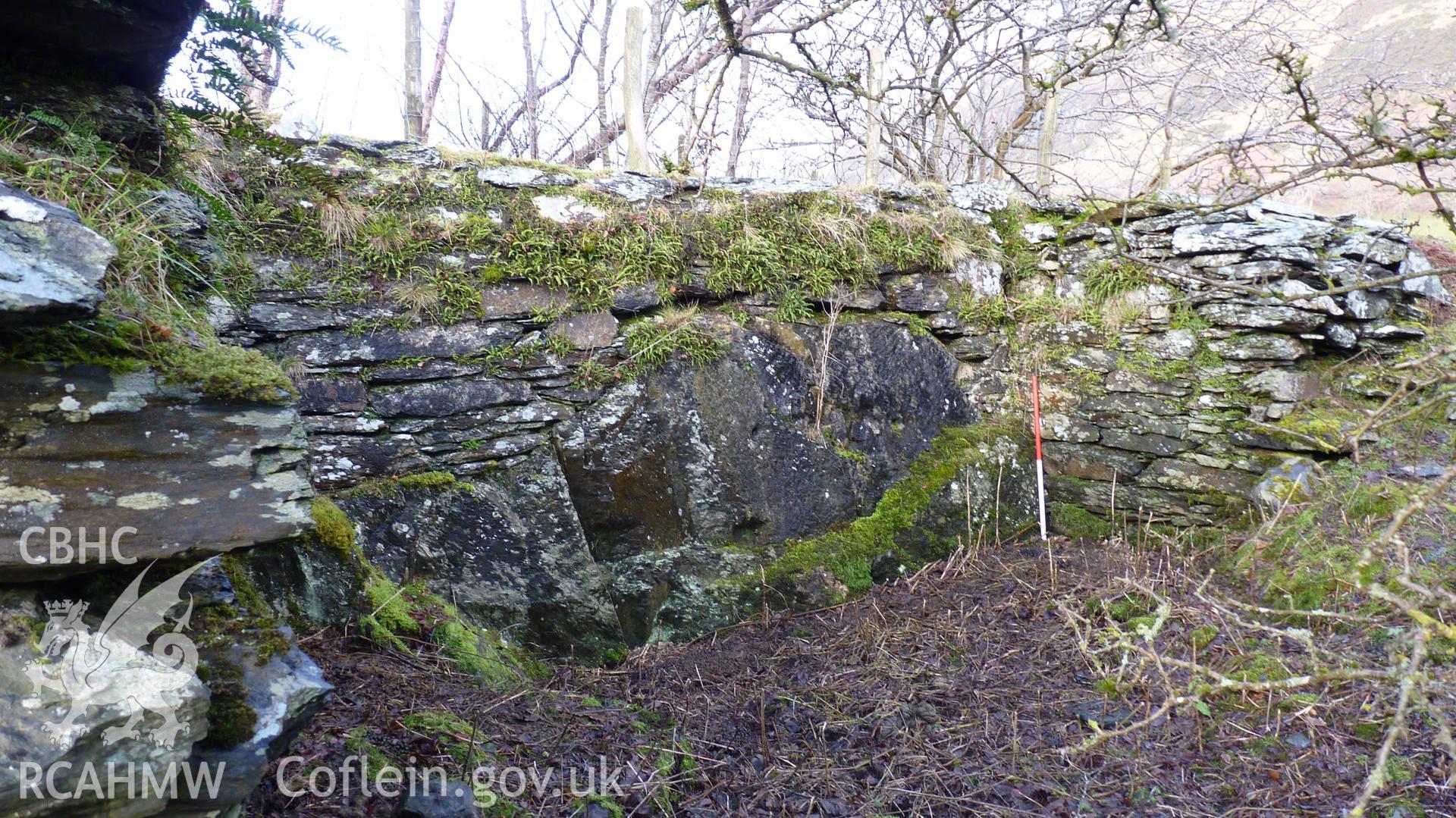 Structural remains adjacent to wheel pit within the metal mining complex. Looking north west. Photographed for Archaeological Desk Based Assessment of Afon Claerwen, Elan Valley, Rhayader. Assessment by Archaeology Wales in 2017-18. Project no. 2573.