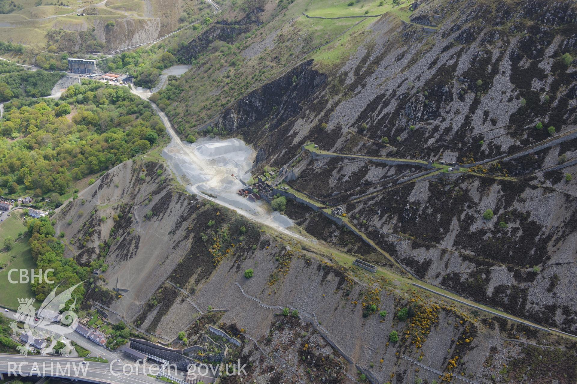 Penmaenmawr quarry. Oblique aerial photograph taken during the Royal Commission?s programme of archaeological aerial reconnaissance by Toby Driver on 22nd May 2013.