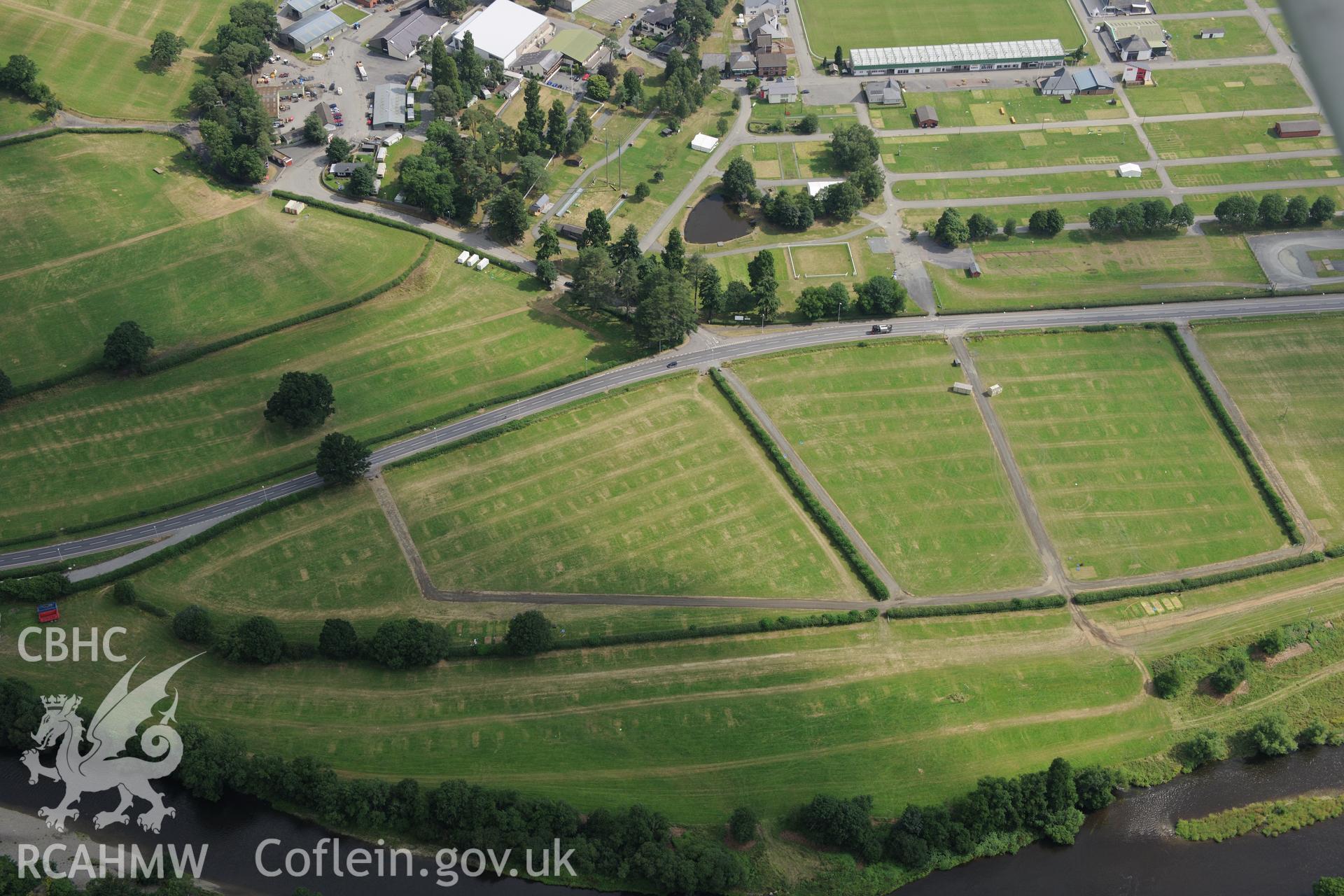 The Royal Welsh Showground, Llanelwedd. Oblique aerial photograph taken during the Royal Commission?s programme of archaeological aerial reconnaissance by Toby Driver on 1st August 2013.