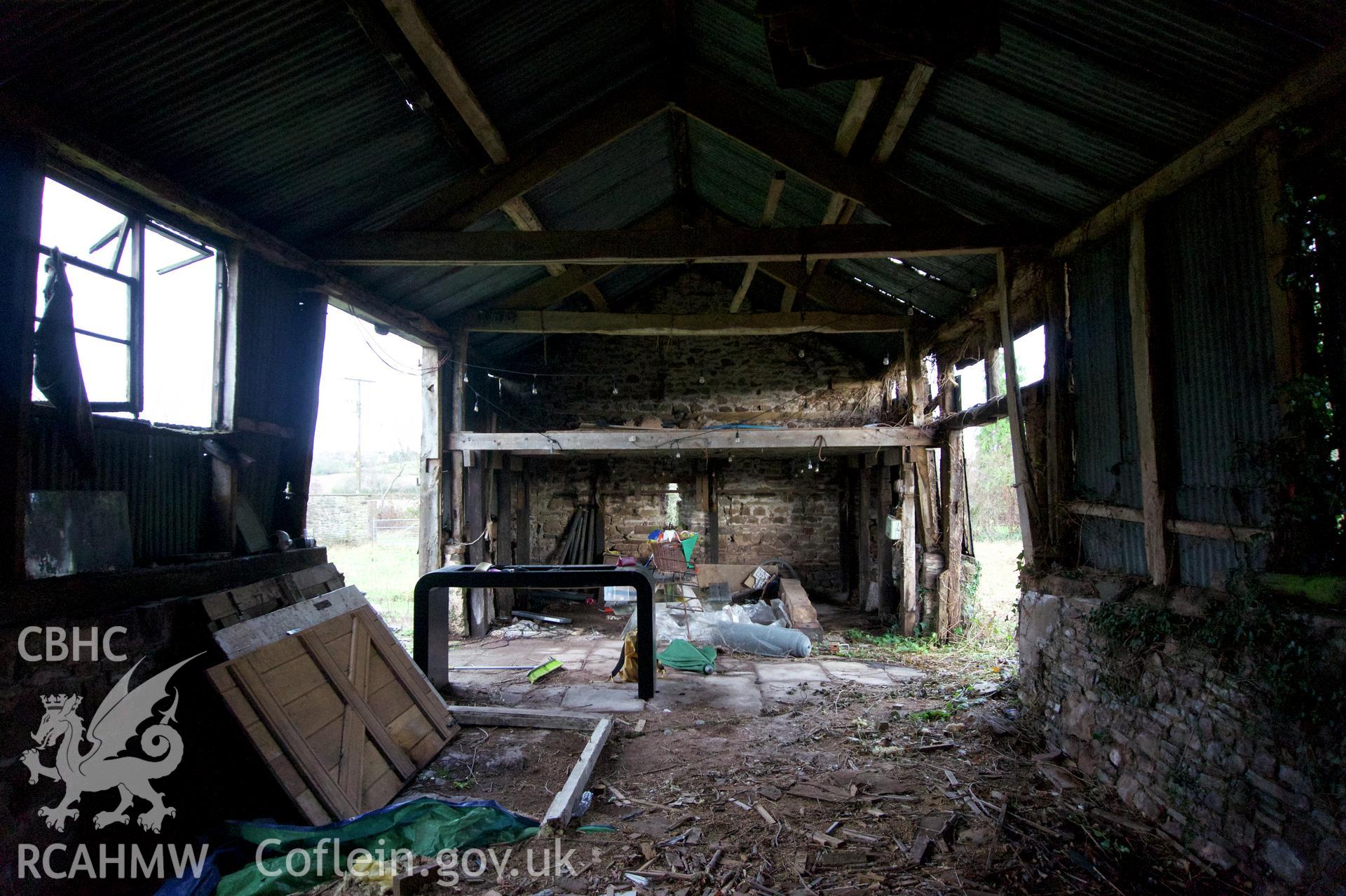 Internal view looking west to east at Middle Ton Threshing Barn. Photographed for the Historic Building Photographic Record of Middle Ton Threshing Barn, Llanvapley, by Dan Courtney of Cog Architects, 2019.