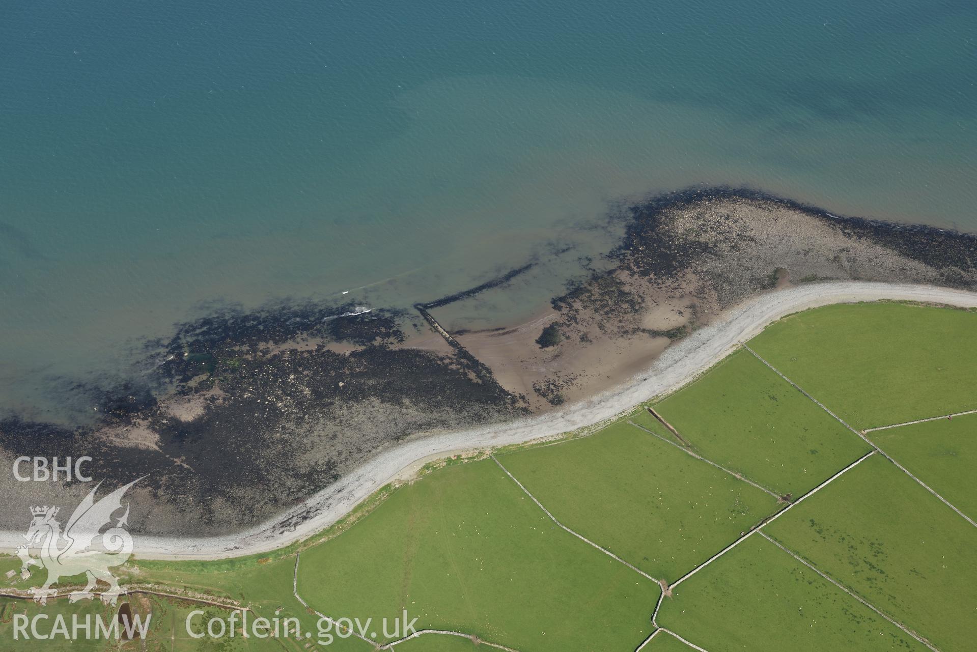 Aerial photography of Llwyngwril fish trap taken on 3rd May 2017.  Baseline aerial reconnaissance survey for the CHERISH Project. ? Crown: CHERISH PROJECT 2017. Produced with EU funds through the Ireland Wales Co-operation Programme 2014-2020. All material made freely available through the Open Government Licence.