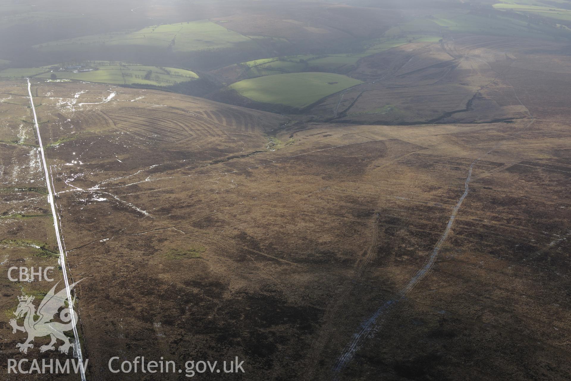 Landscape view of Rhos Wen near Pencader. Oblique aerial photograph taken during the Royal Commission's programme of archaeological aerial reconnaissance by Toby Driver on 6th January 2015.