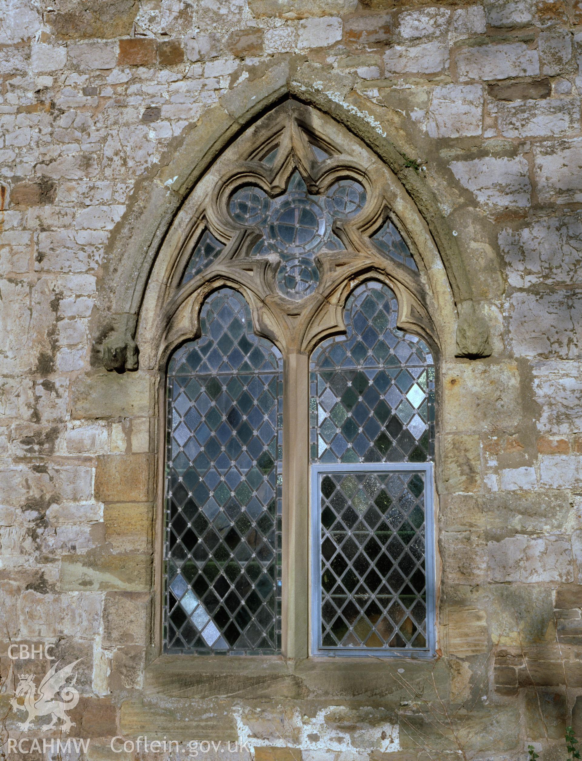 Digital copy of a colour negative showing detail view of the south window to the east of the porch at St Mary's Church, Conwy.