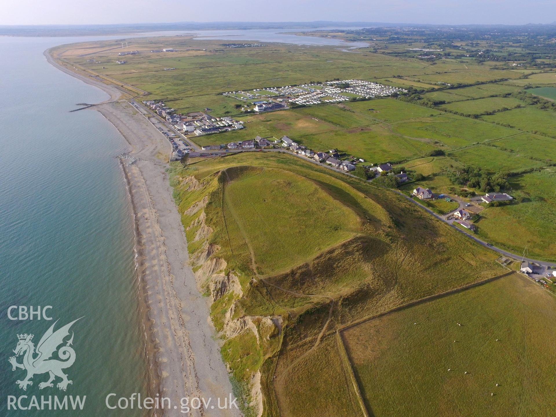 Aerial view of Dinas Dinlle Hillfort, Llandwrog. Colour photograph taken by Paul R. Davis on 23rd June 2018.