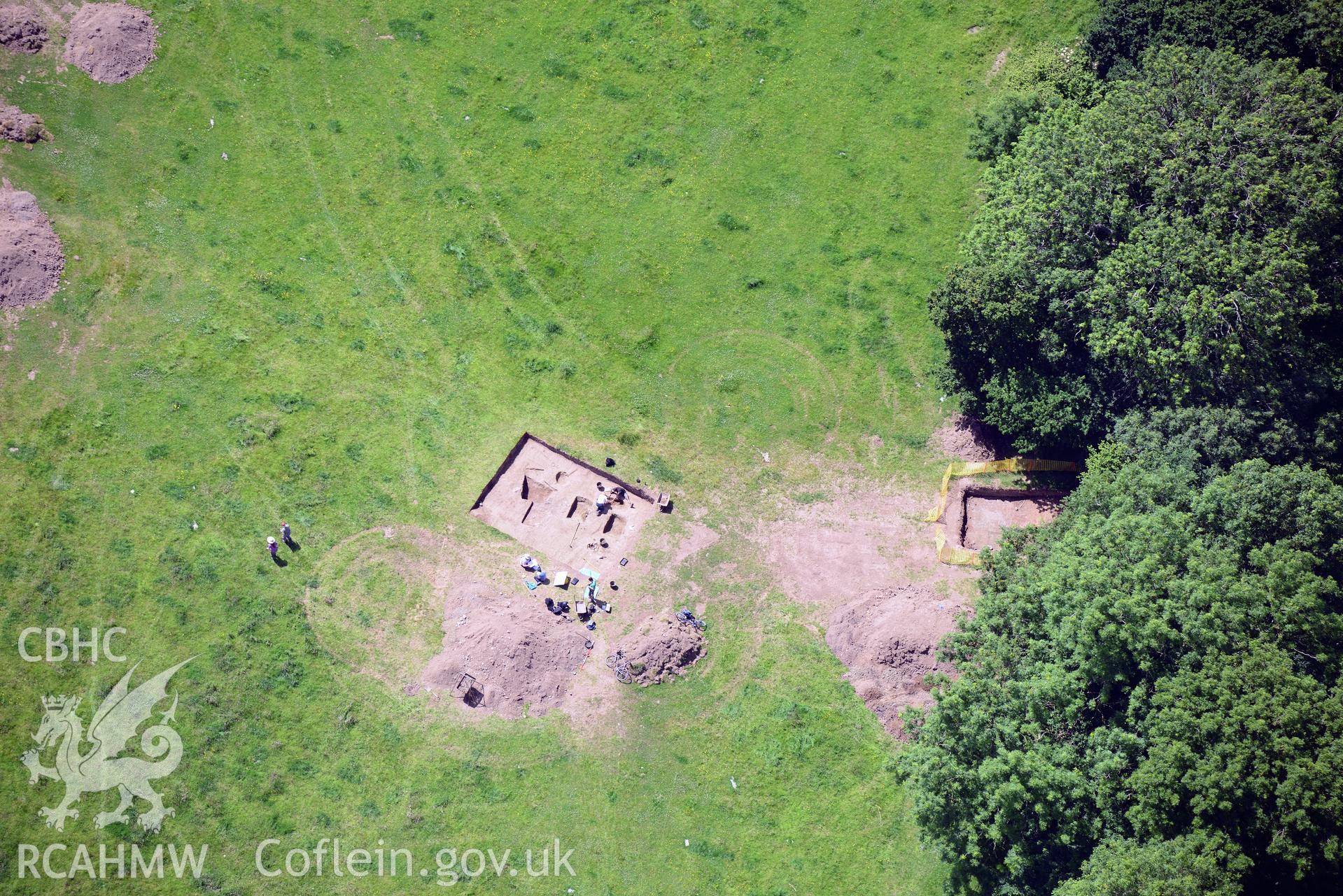 Excavation of Caerau Hillfort, Ely, conducted by Cardiff University. Oblique aerial photograph taken during the Royal Commission's programme of archaeological aerial reconnaissance by Toby Driver on 29th June 2015.