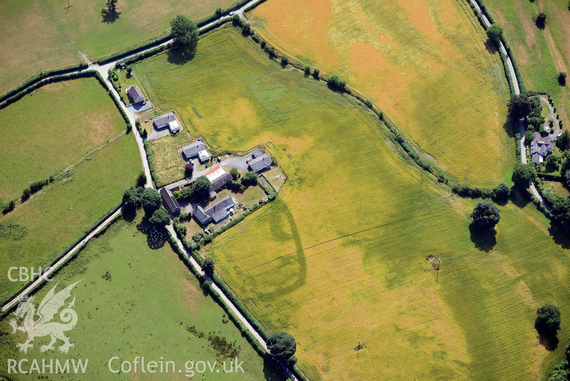 Royal Commission aerial photography of Plas Adda defended enclosure cropmarks taken on 19th July 2018 during the 2018 drought.