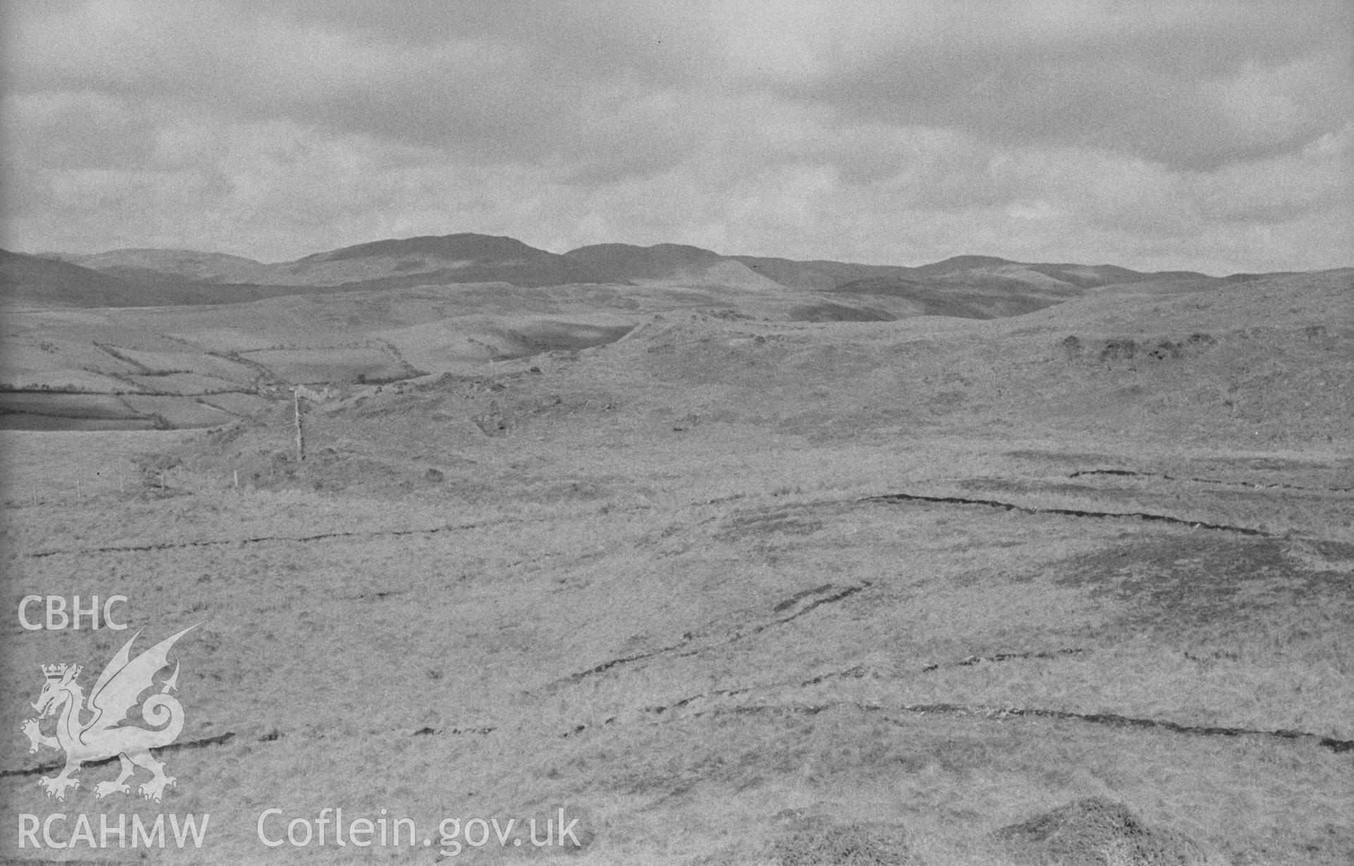 Digital copy of a black and white negative showing northwest corner of Pen Dinas, Elerch. Photographed in April 1963 by Arthur O. Chater from Grid Reference SN 6764 8767, looking north north east.