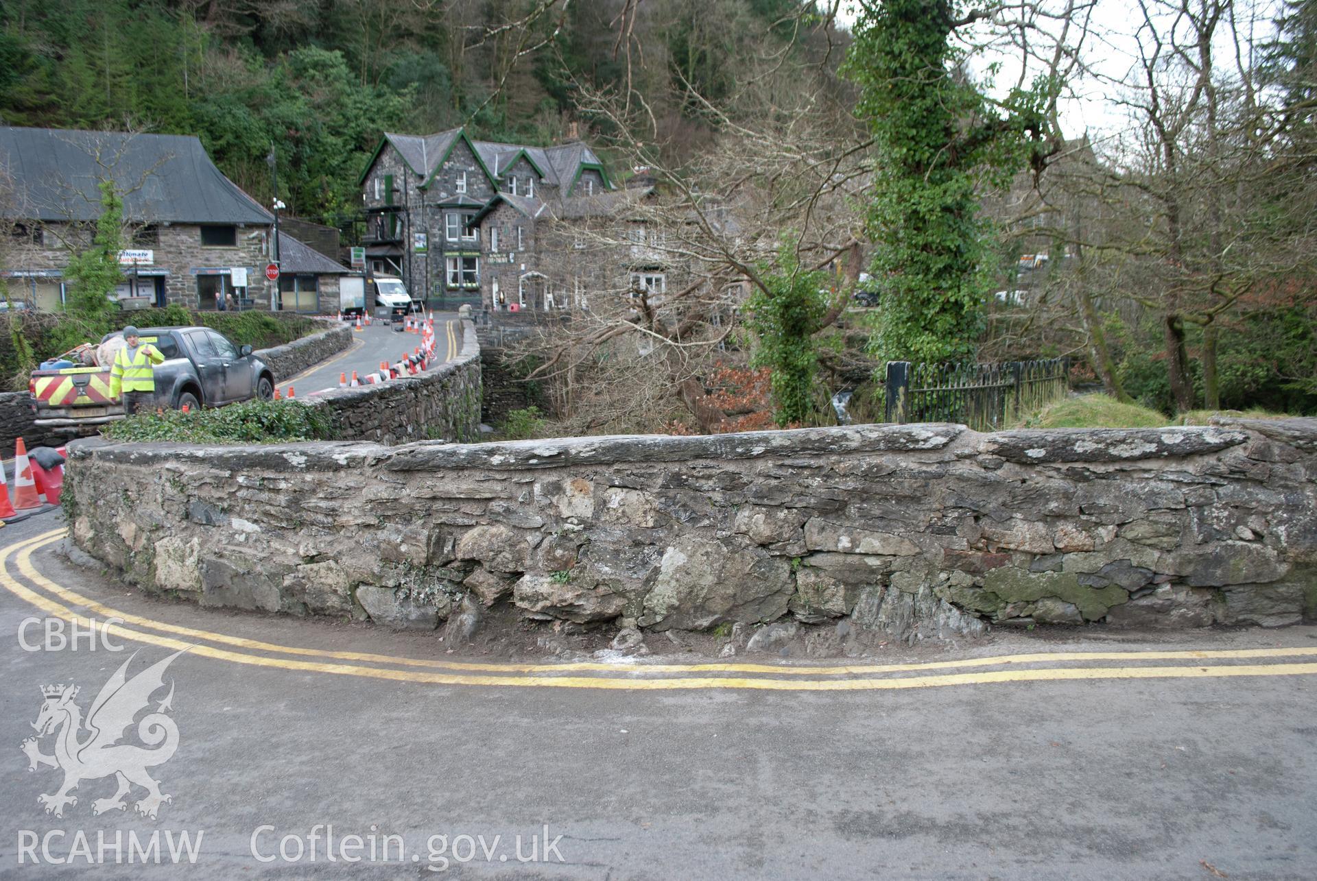 View of the carriageway side of the northwest parapet repair work. View from the north west. Digital photograph taken for Archaeological Watching Brief at Pont y Pair, Betws y Coed, 2019. Gwynedd Archaeological Trust Project no. G2587.