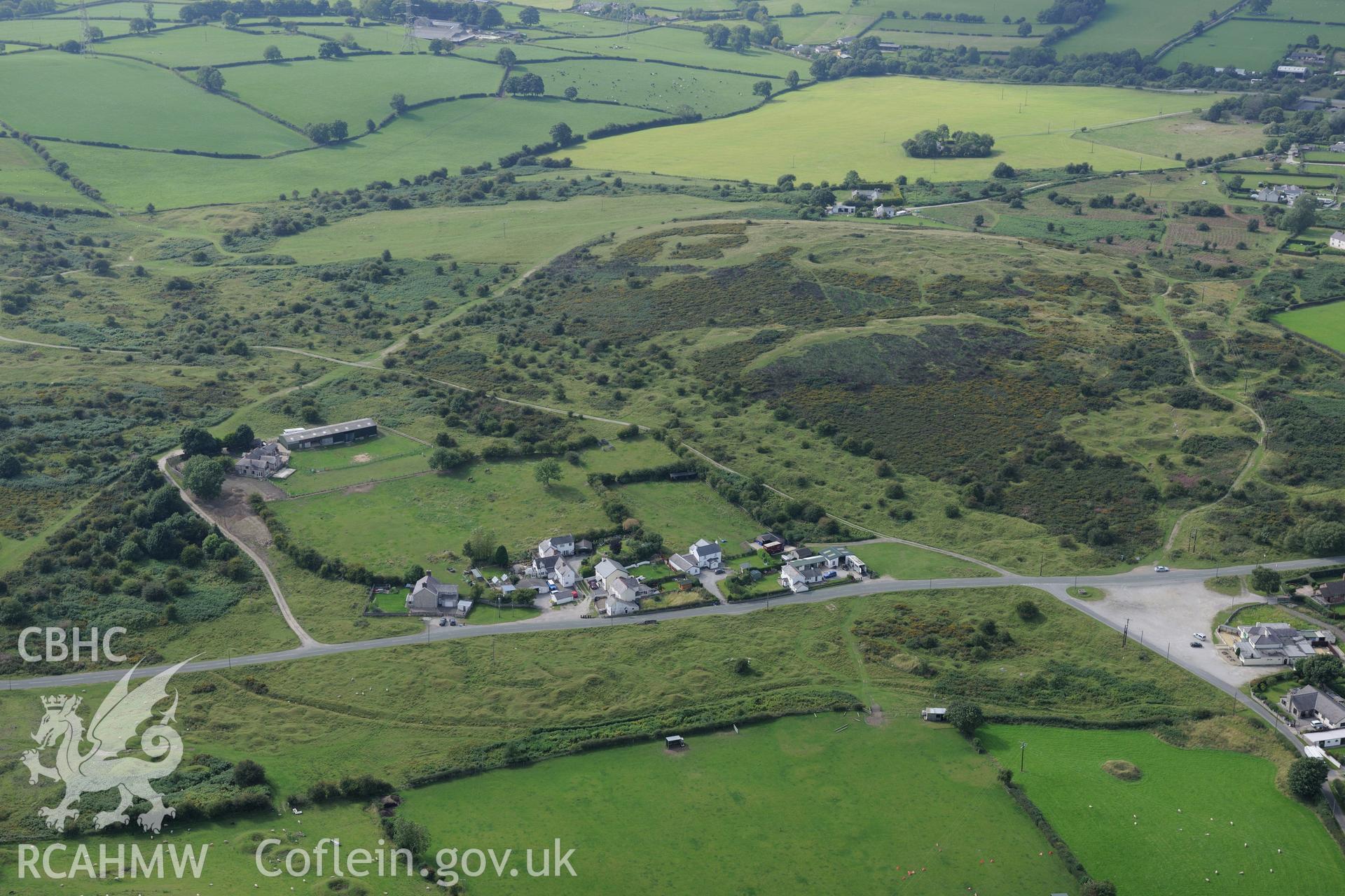 Henblas limestone quarry, Pentre Halkyn, Holywell. Oblique aerial photograph taken during the Royal Commission's programme of archaeological aerial reconnaissance by Toby Driver on 11th September 2015.