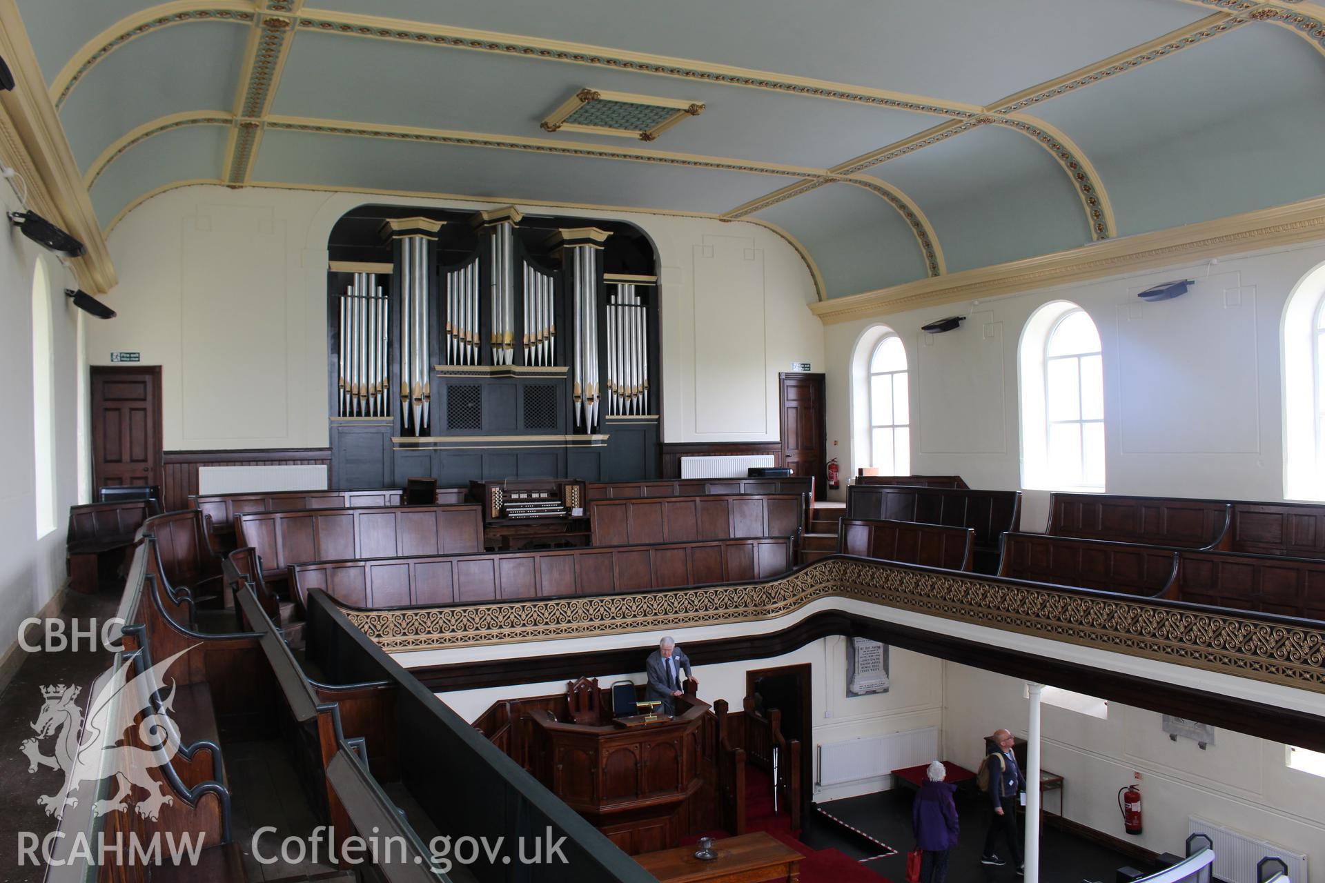 Colour photograph showing interior view looking from first floor balcony towards organ at Mynydd-Bach Independent Chapel, Treboeth, Swansea. Taken during photographic survey conducted by Sue Fielding on 13th May 2017.